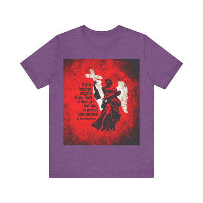 Heather Team Purple t-shirt featuring a textured cemetery angel and a St John Chrysostom quote on Christian perfection—"Little Divides Angels from Men"—expressing Orthodox Christian faith and self-improvement.