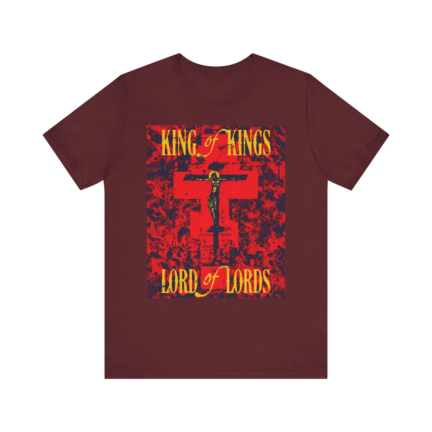 Maroon "King of Kings, Lord of Lords" T-shirt featuring a Christ Crucified Orthodox icono-graphic in a yellow and red design with nature texture, made from lightweight cotton for a comfortable unisex fit and inspired by the proclamation of the Word of God.
