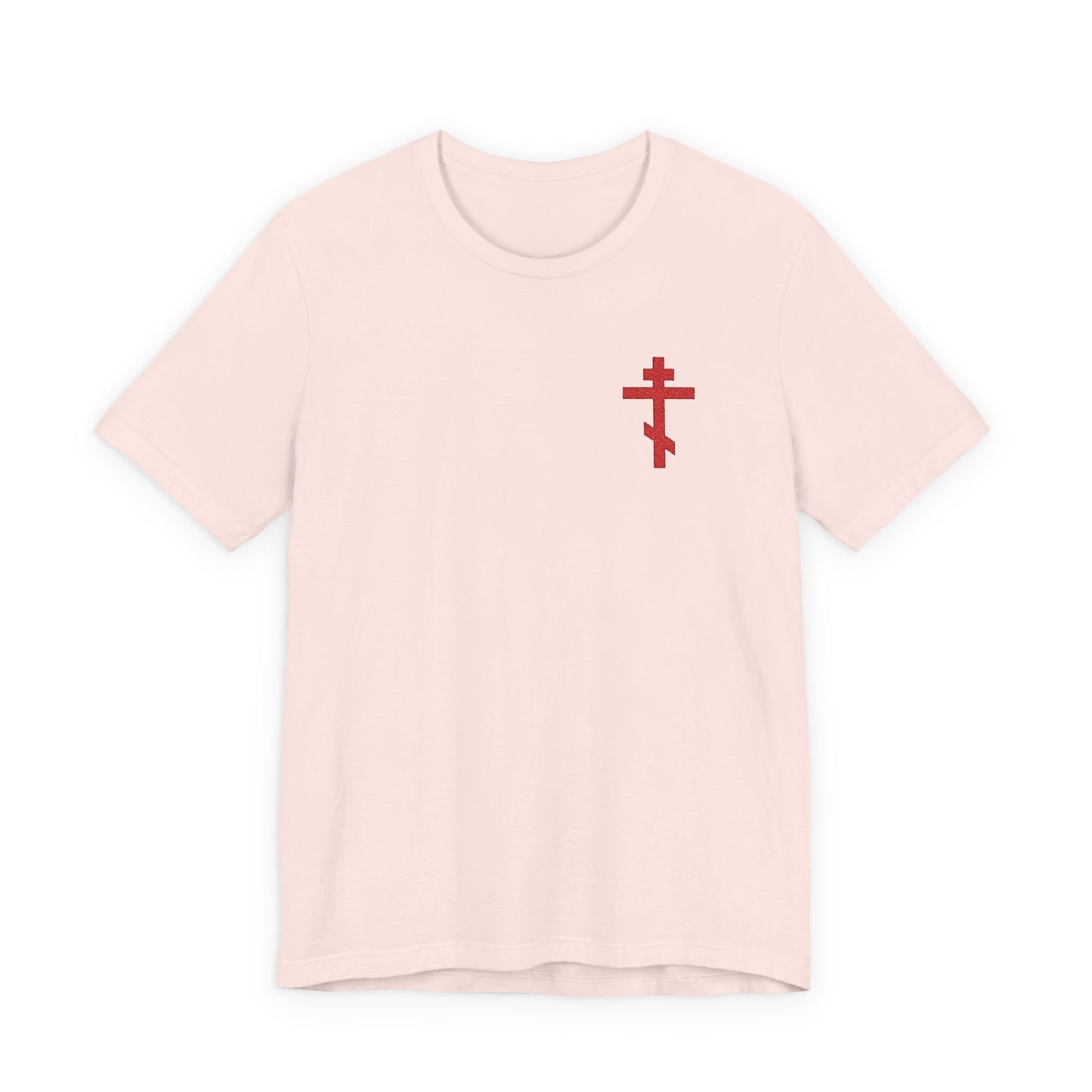 Soft pink unisex cotton t-shirt with a small red embroidered Orthodox cross, inspired by Galatians 6:14—“May I Never Boast Except in the Cross.”.