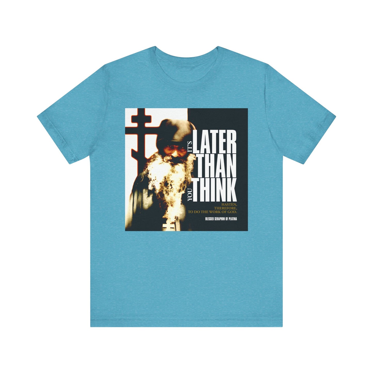 Heather Aqua unisex t-shirt featuring St Seraphim Rose’s photo with modern cinematic poster typography: "It's Later Than You Think"—a stylish Orthodox statement on life's deeper meaning. Lightweight cotton for everyday comfort.