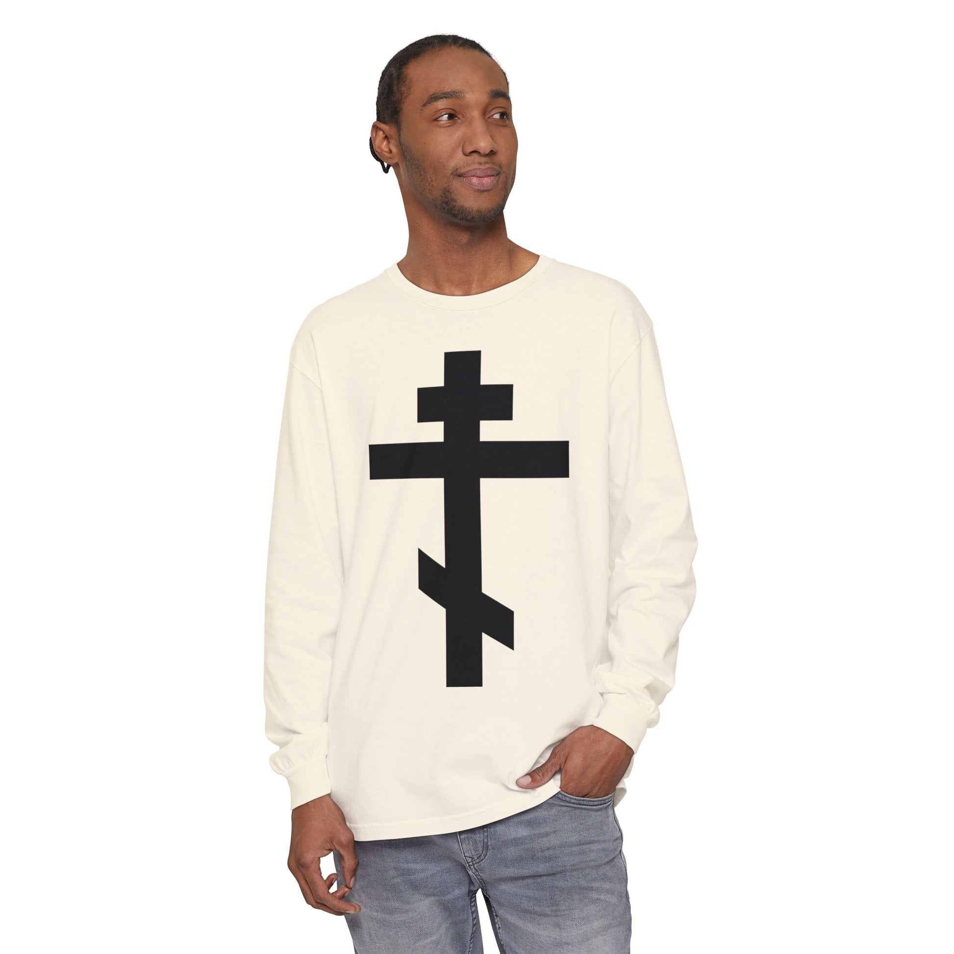 A man wears the Black Orthodox Cross Long Sleeve Shirt, featuring Galatians 6:14: "May I never boast, except in the cross of our Lord Jesus Christ," and a bold black cross on the front.