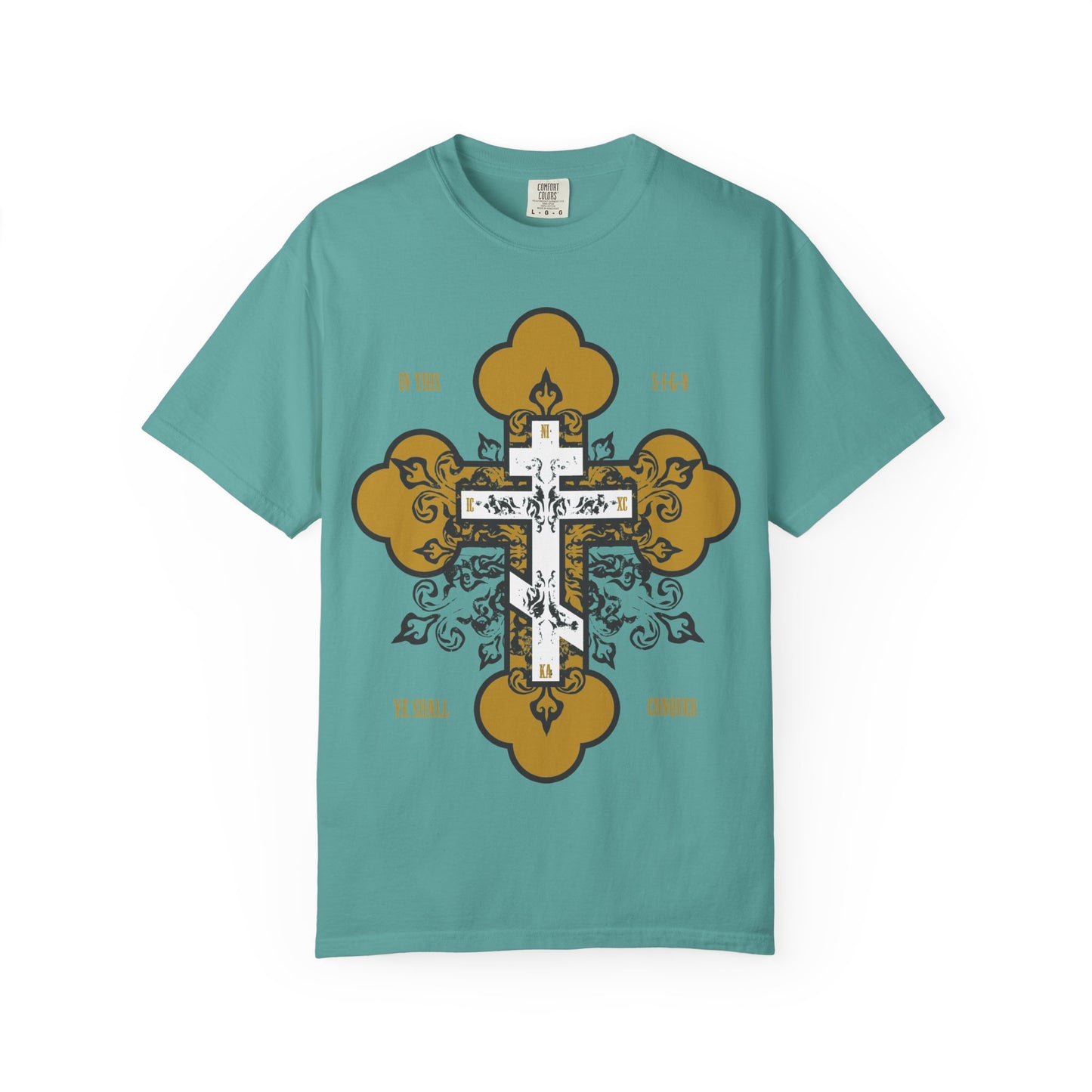 Seafoam heavyweight cotton unisex tee featuring an ornate gold and white Orthodox cross with "In Hoc Signo Vinces" and decorative text surrounding the design—this "In This Sign Ye Shall Conquer" t-shirt is a striking Christian inspirational shirt. Crafted for both comfort and style, it blends meaningful symbolism with timeless everyday wear.