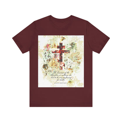 Maroon t-shirt with a white and beige floral scrapbook texture cross, inspired by St Irenaeus and Orthodox Christian arts & crafts style. Features a central faith quote and an artsy, Christian design.