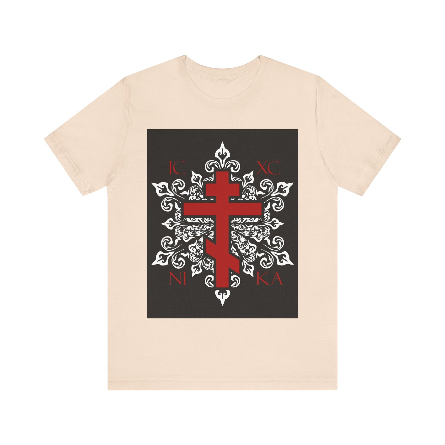 Soft cream unisex cotton tee featuring an ornate white medieval floral design with a bold red ICXC/NIKA Orthodox Cross at the center—an exclusive best-selling Christian shirt perfect for any occasion.