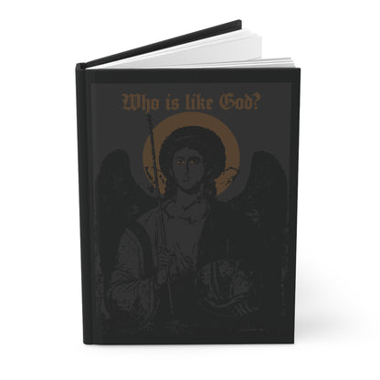 A black and bronze hardcover journal titled “Who Is Like God? Archangel Michael Icono-Graphic w/ Cross on Front Left Breast” features a striking dark angel illustration on the cover, capturing the powerful presence of Archangel Michael in Orthodox Christian tradition—a perfect choice for those seeking a goth Christian design.