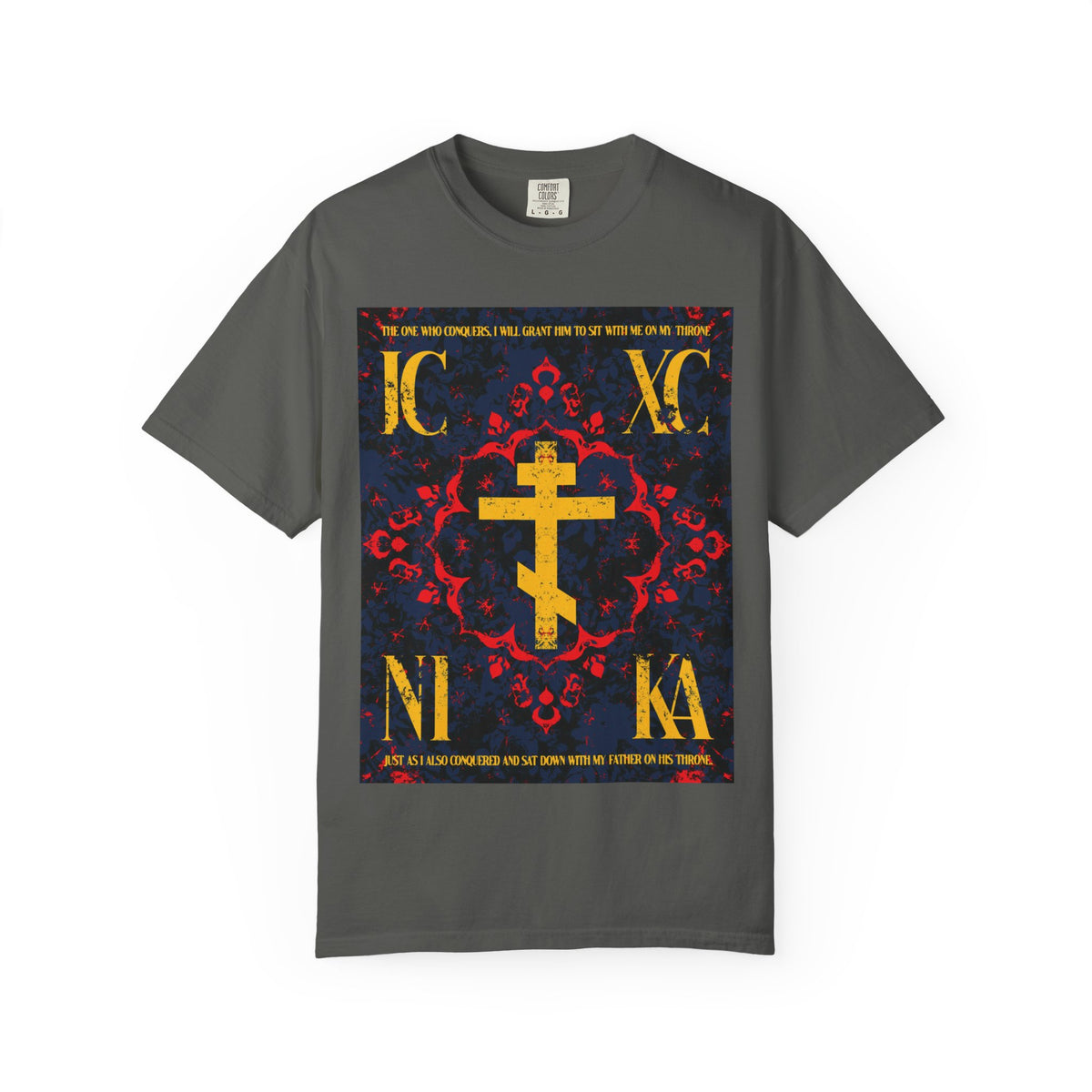 Pepper-colored heavyweight cotton unisex T-shirt featuring the IC XC NIKA Orthodox Cross with a medieval floral design, inspired by “The One Who Conquers” (Revelation 3:21), symbolizing the victory of grace and personal effort on the journey to salvation.