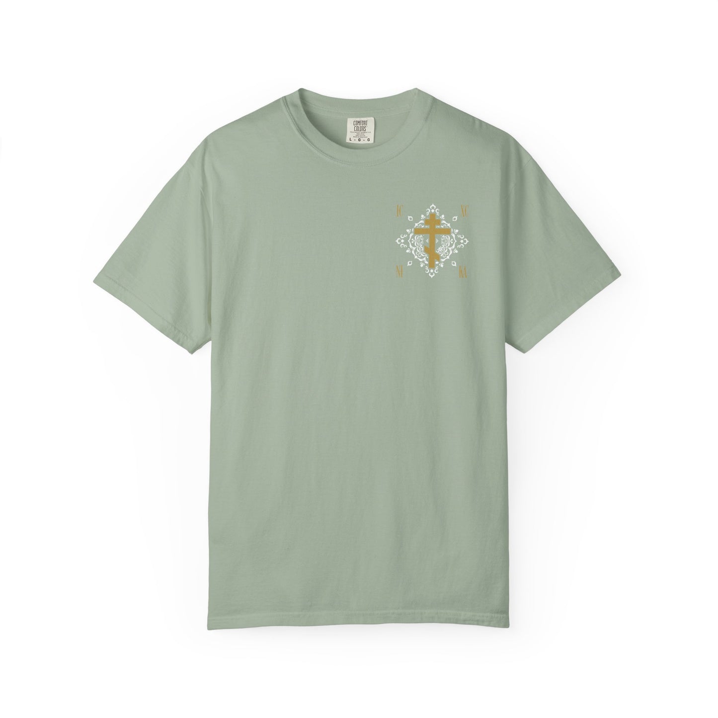 Bay-colored heavyweight cotton unisex t-shirt featuring a small gold Orthodox Cross ICXC NIKA with a white medieval ornate floral pattern on the upper left chest, symbolizing “Jesus Christ Conquers.”.