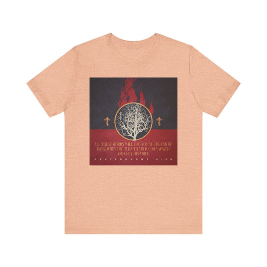 Heather peach lightweight cotton tee featuring a burning bush, Orthodox crosses, and Deut. 4:30—reminding us of YHVH’s presence at the end of days. “All These Words Will Find You at the End of Days” unisex Christian shirt.