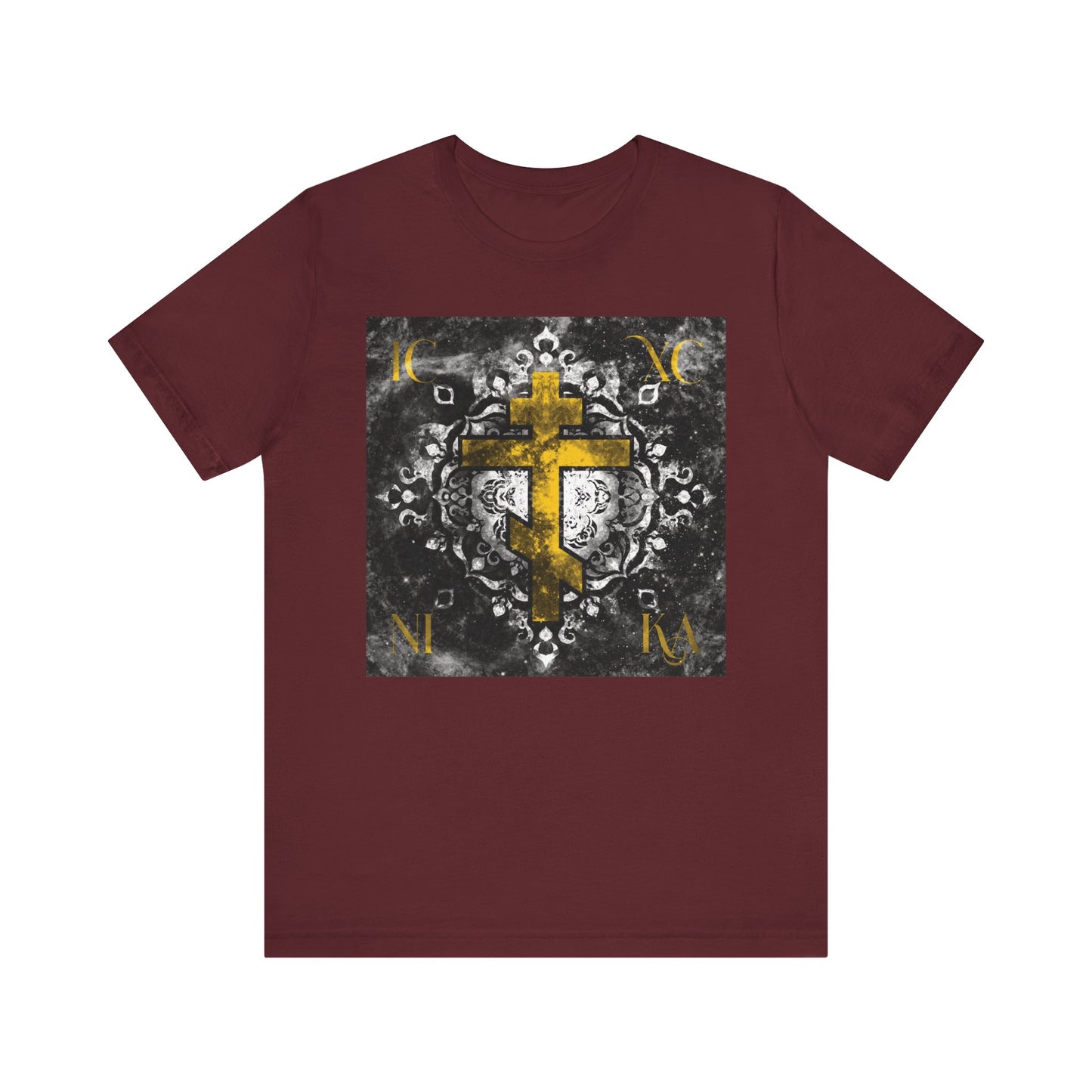 Gold ICXC NIKA Orthodox Cross tee featuring a grayscale ornate floral texture background, inspired by Wednesday Matins and reflecting the enduring strength of Christ God.