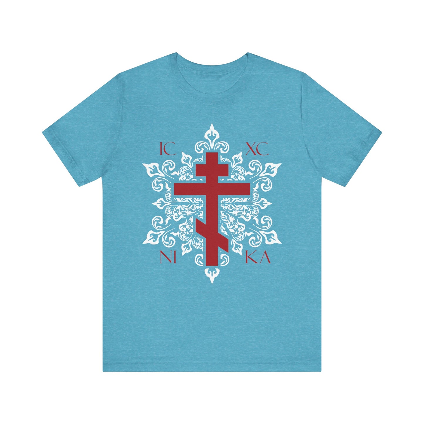 Heather Aqua unisex tee featuring a red ICXC/NIKA Orthodox cross with ornate white medieval floral design and Greek letters—a best-selling lightweight cotton t-shirt inspired by Orthodox Christian tradition.