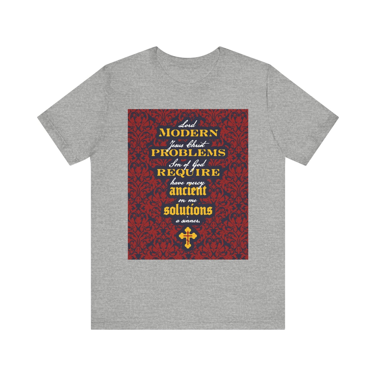 Athletic Heather t-shirt featuring the phrase "Modern Problems Require Ancient Solutions" with a floral background and the divine name of Jesus Christ, accented by a small cross at the bottom.
