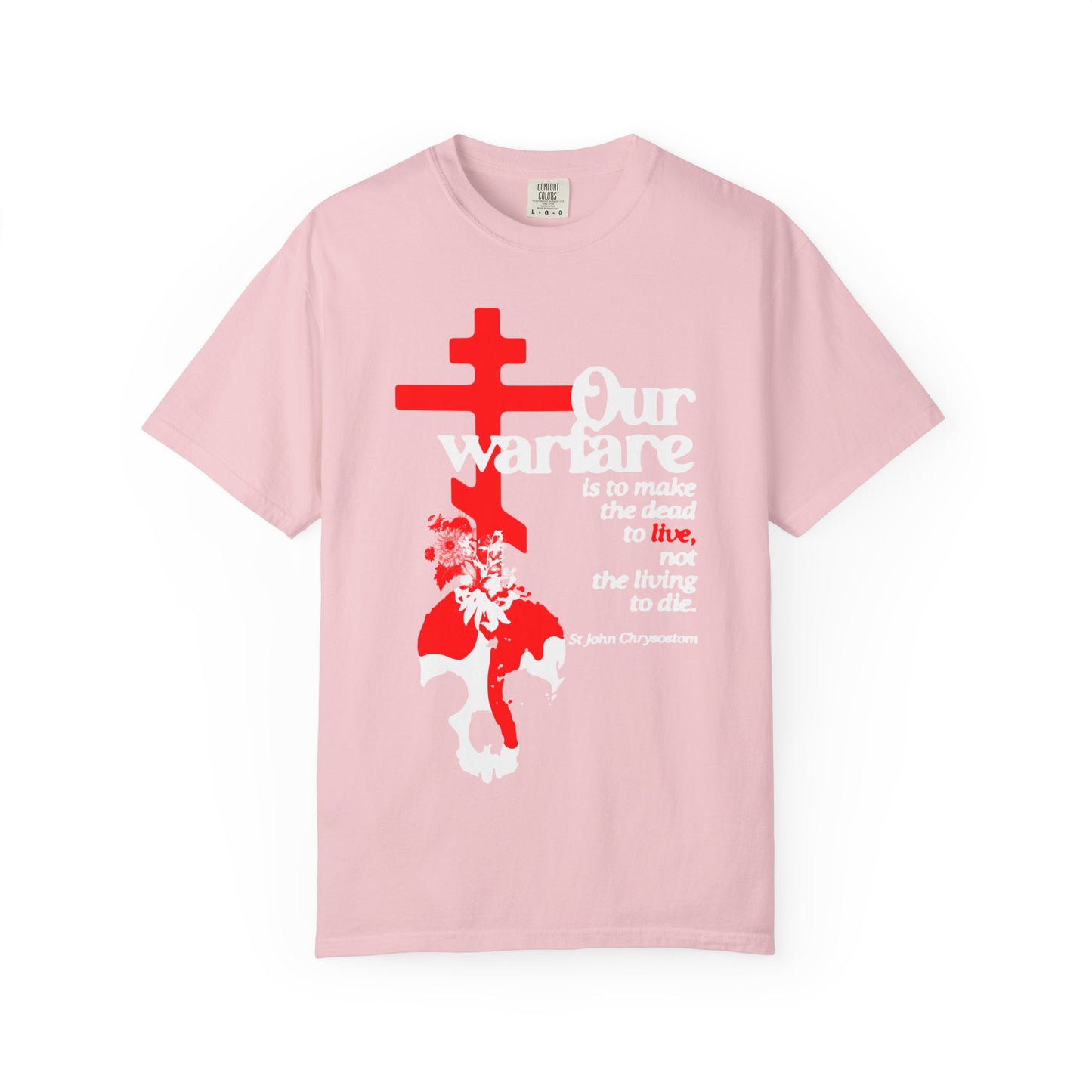 Blossom-colored heavyweight cotton unisex tee featuring an Orthodox cross, floral and skull illustration, and a white quote from St. John Chrysostom: "Our Warfare is the Make the Dead to Live," inspired by his teachings on priesthood authority and Christian power.