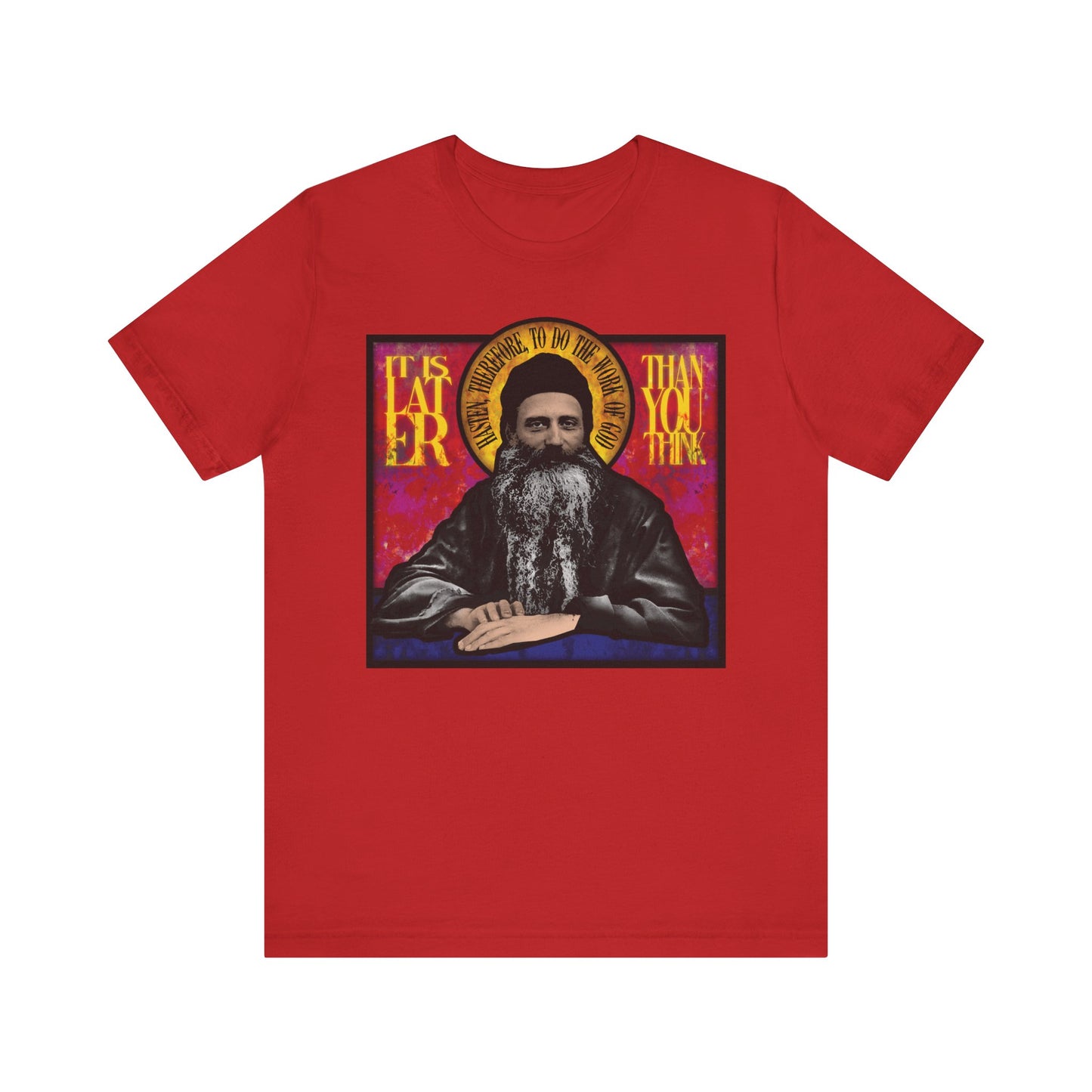 Red lightweight cotton unisex t-shirt featuring a stained glass image of Fr. Seraphim Rose with the text "It Is Later Than You Think"—a thoughtful nod to American Orthodox monastic tradition and reflection.