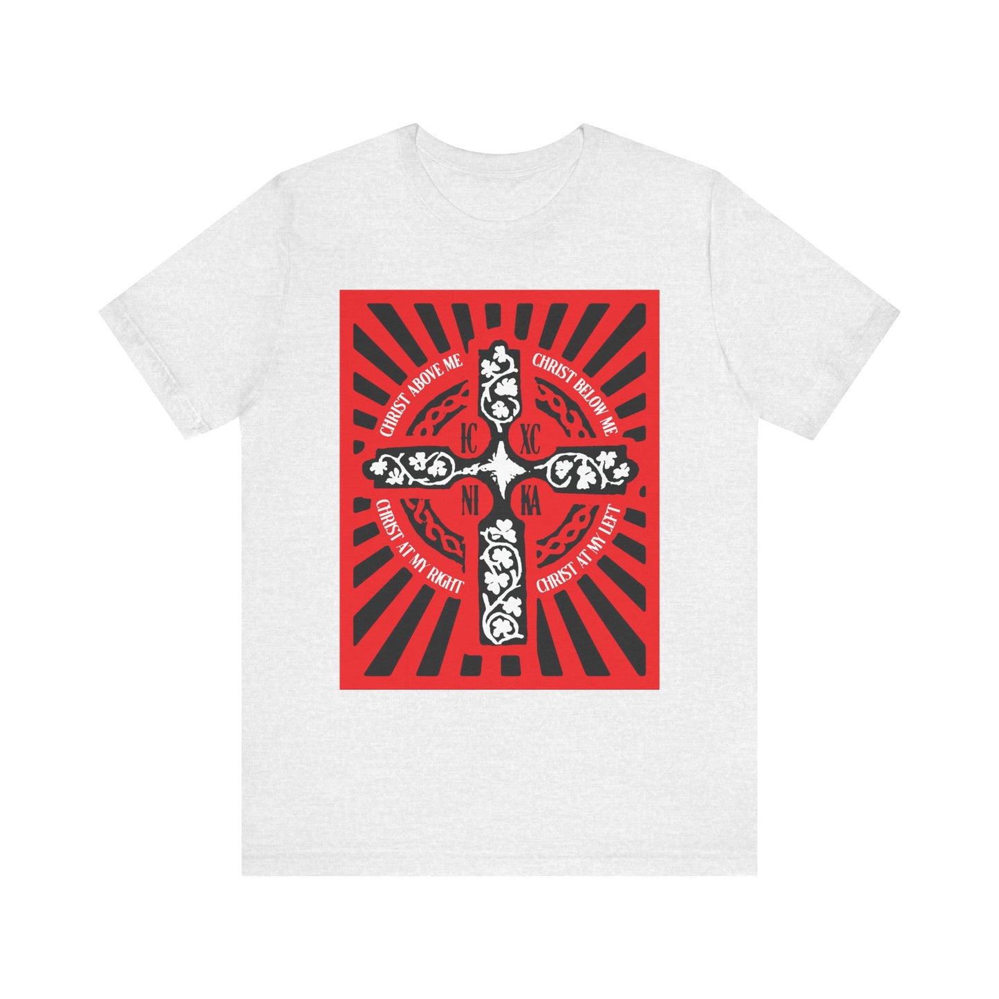 Ash t-shirt featuring a red ICXC NIKA Enniskillen Celtic Cross design, with Orthodox Christian phrases—including verses from the Lorica of St. Patrick—radiating outward on the front in the style of a Celtic blessing.