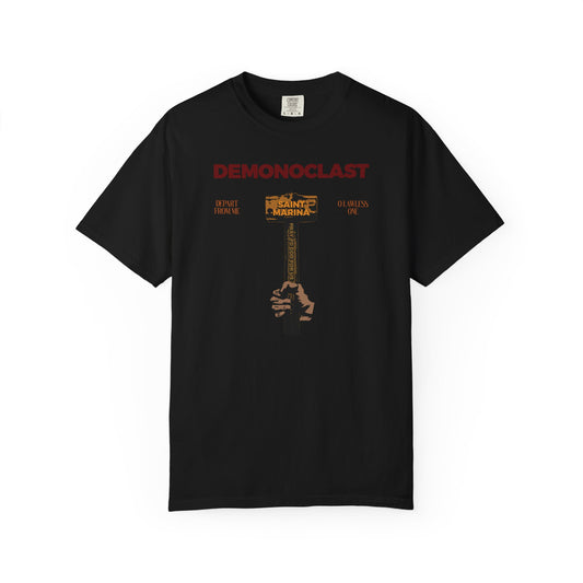 Black heavyweight cotton unisex tee featuring "DEMONOCLAST" in red and an illustrated NIKA fist holding St. Marina’s hammer, inspired by Orthodox themes of Christ Conquers, unseen warfare, and martyrdom.