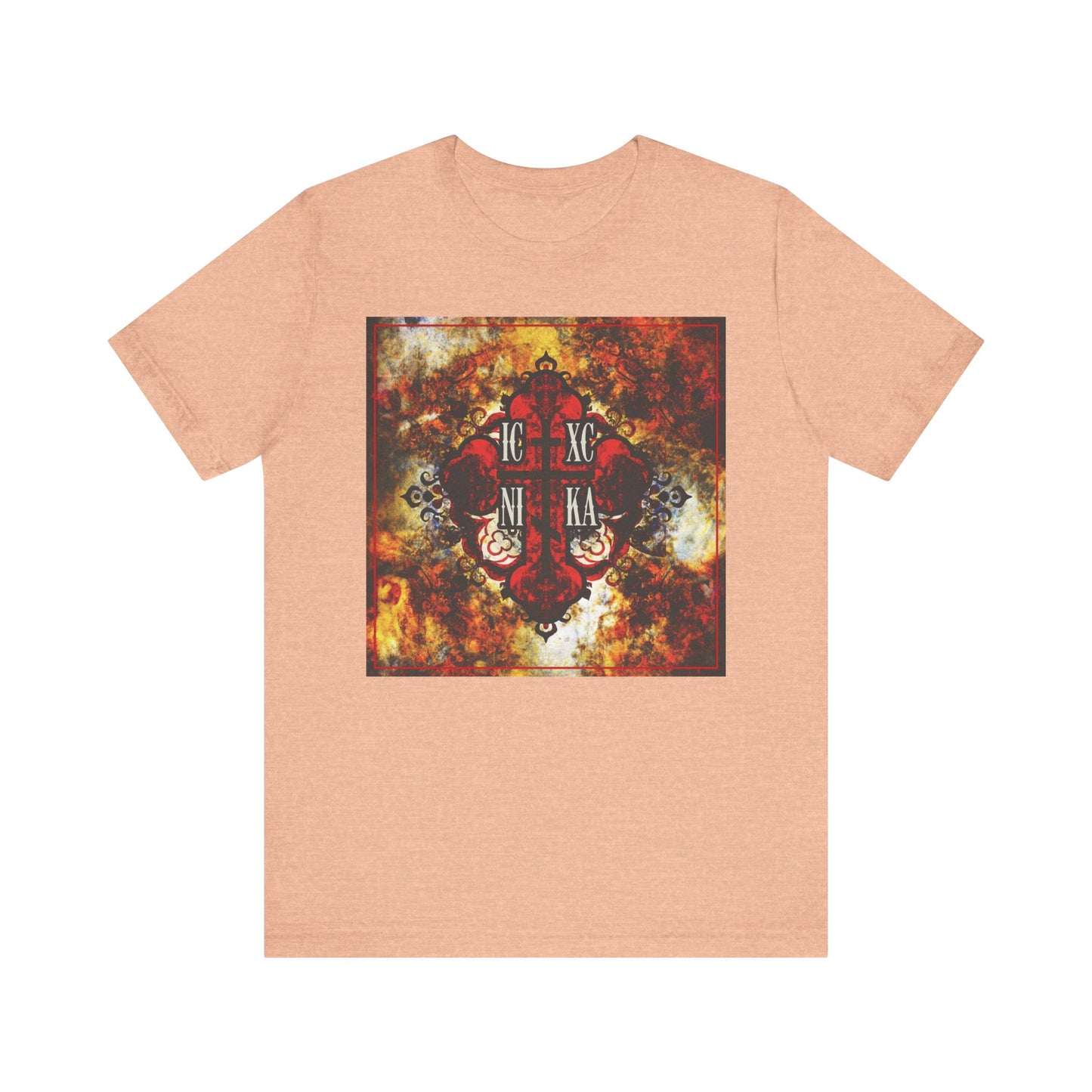 Heather peach t-shirt featuring a bold, colorful textured red Orthodox cross with Cyrillic ICXC NIKA letters—this lightweight cotton unisex tee is inspired by the teachings of St. Ambrose of Optina and is perfect for keeping Jesus in your heart wherever you go.
