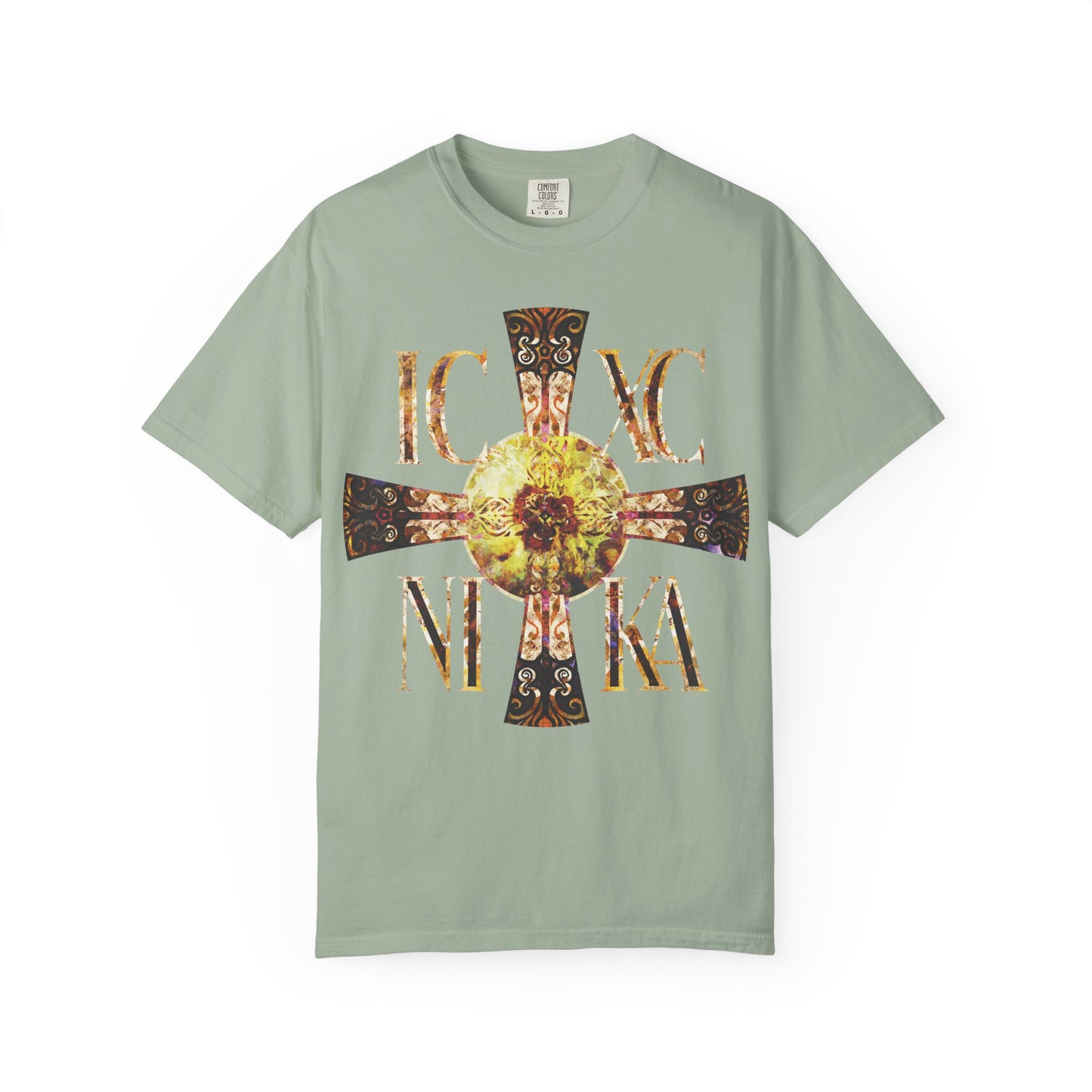 Bay-colored unisex heavyweight cotton tee featuring a large Celtic-style equal armed cross with Greek letters ICXC NIKA and a bright solar texture, inspired by the never-setting Sun and honoring the Theotokos.