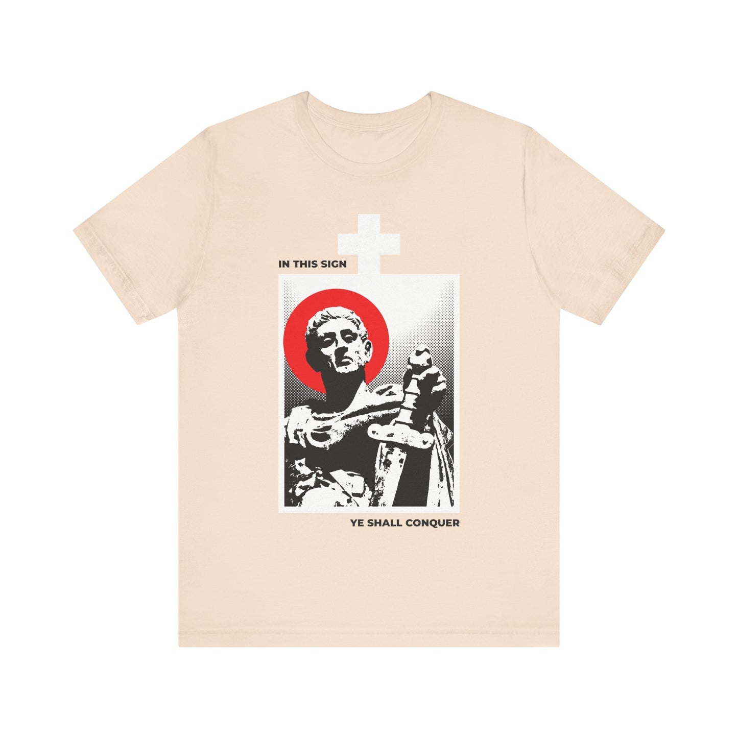 Soft cream cotton t-shirt featuring a graphic of St Constantine the Great with sword, red halo, white cross, and the phrase "In This Sign Ye Shall Conquer"—a meaningful design for Orthodox Christians.