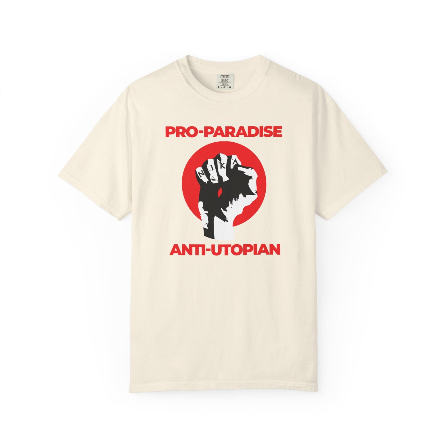 Ivory heavyweight cotton unisex t-shirt featuring a raised fist and Jesus Christ Crucified NIKA graphic with "Pro-Paradise Anti-Utopian"—resist the dominant secular paradigm.
