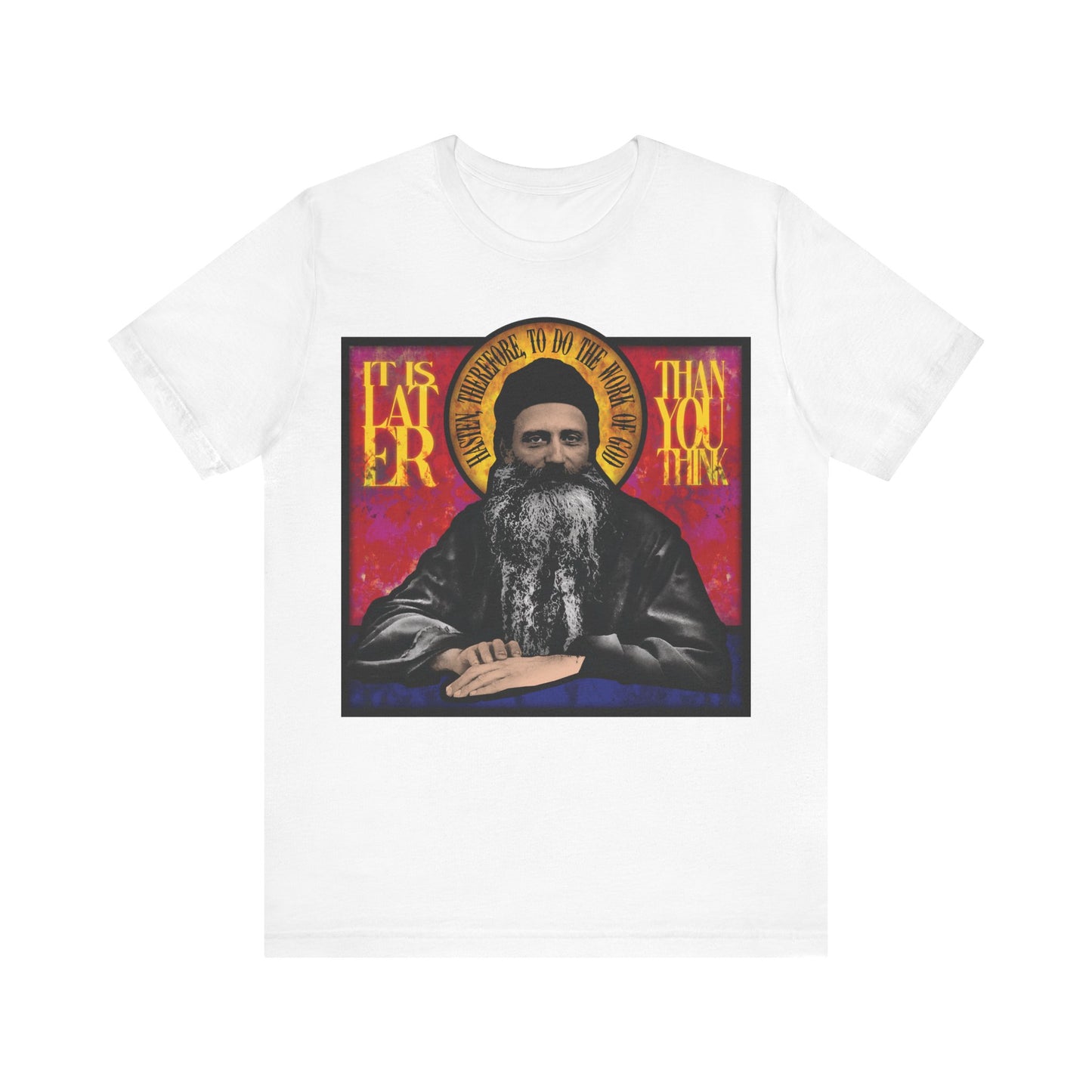 White cotton t-shirt with stained glass design featuring Fr. Seraphim Rose, titled "It Is Later Than You Think." Inspired by American Orthodox monastic saint and themes of salvation.