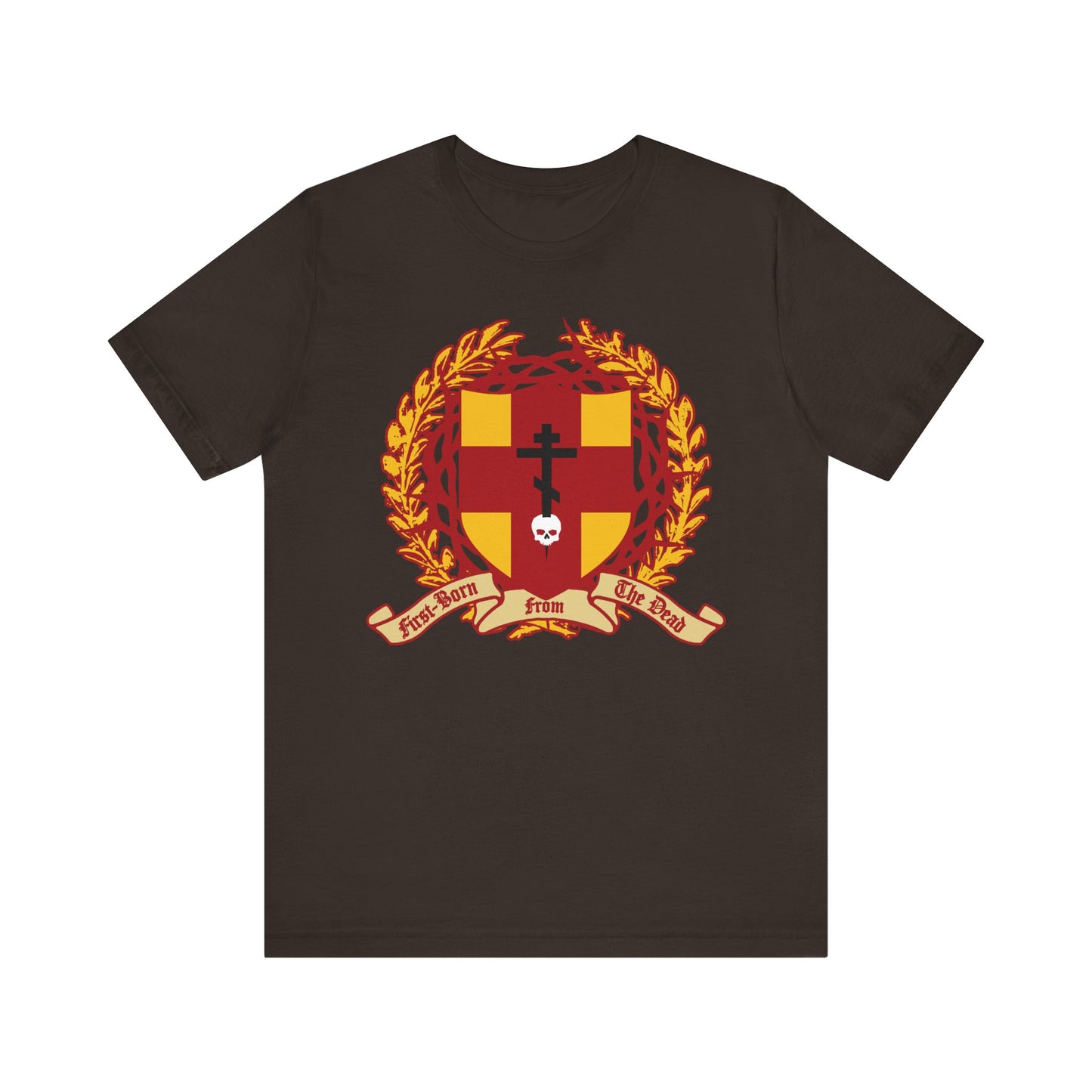 The brown "First-Born from the Dead (Col 1:18)" tee features a heraldic shield with Orthodox cross stabbing a skull, crown of thorns, and crest—symbolizing redemption through His blood; made from lightweight cotton.