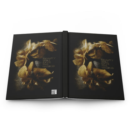 A black cover blank journal titled "Beauty Will Save the World" features golden leaves and celebrates beauty, Dostoevsky, and Jesus Christ as Universal Creator & King in original photographic artwork.