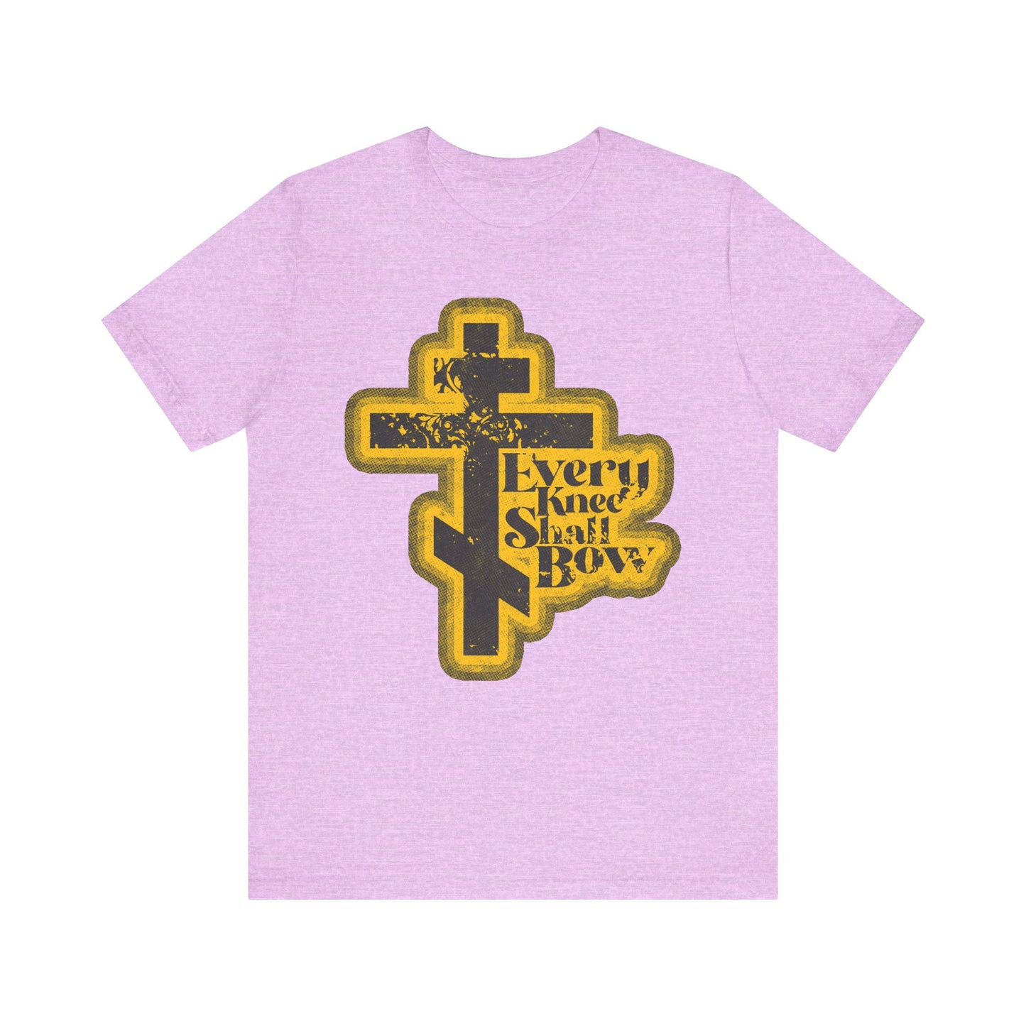 Heather Prism Lilac tee with a 70s distressed comic-book look, featuring "Every Knee Shall Bow," an Orthodox cross, and references to Philippians 2:10-11 and Isaiah 45:23 proclaiming Jesus Christ is Lord.