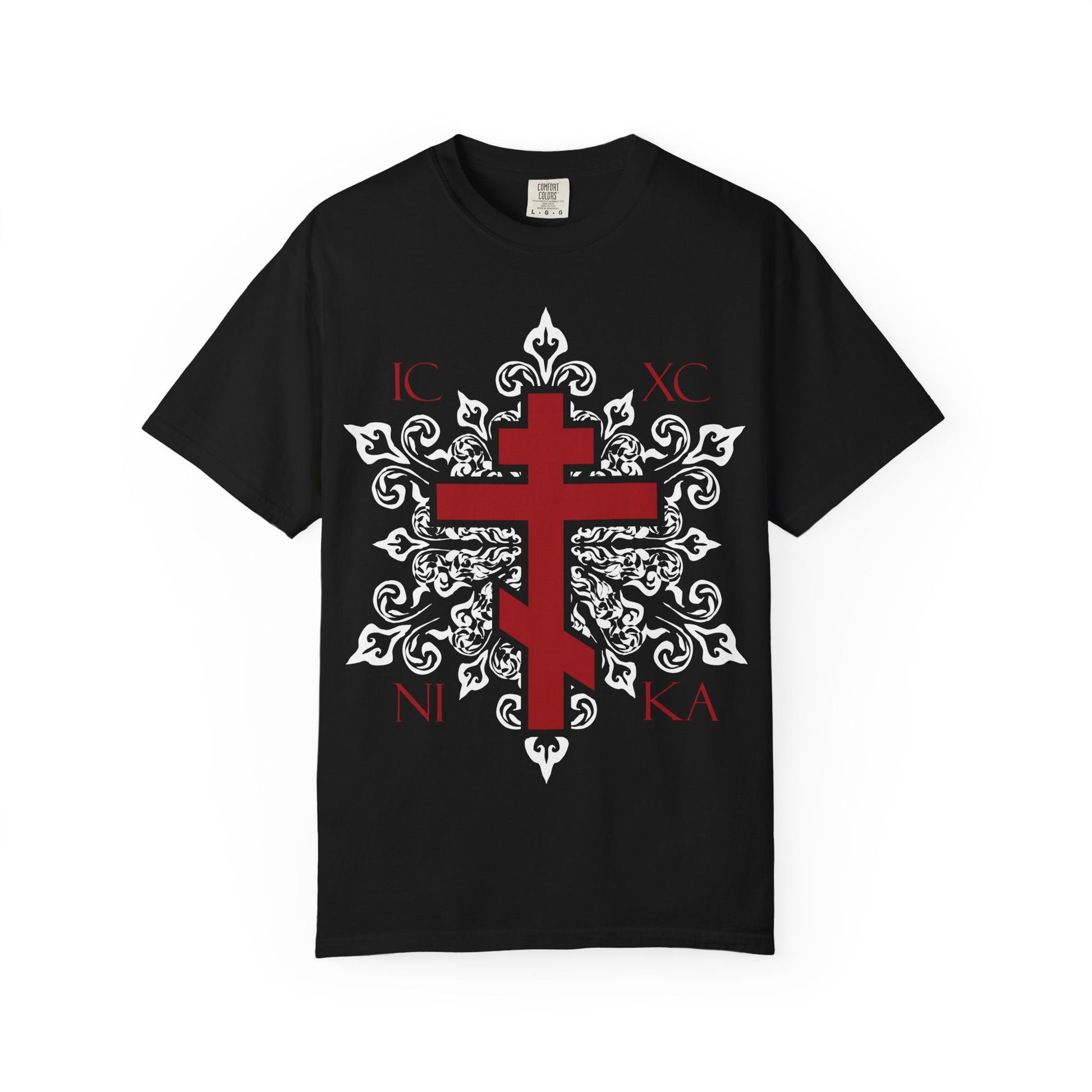 Discover our best-selling “ICXC / NIKA Red Orthodox Cross on Ornate White Medieval Floral Design” unisex tee—a black heavyweight cotton T-shirt featuring a striking red Orthodox cross, intricate white medieval-style floral patterns inspired by the Adoration at the Cross, and the iconic IC XC NI KA letters in each corner for a touch of paradise.