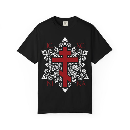 Discover our best-selling “ICXC / NIKA Red Orthodox Cross on Ornate White Medieval Floral Design” unisex tee—a black heavyweight cotton T-shirt featuring a striking red Orthodox cross, intricate white medieval-style floral patterns inspired by the Adoration at the Cross, and the iconic IC XC NI KA letters in each corner for a touch of paradise.