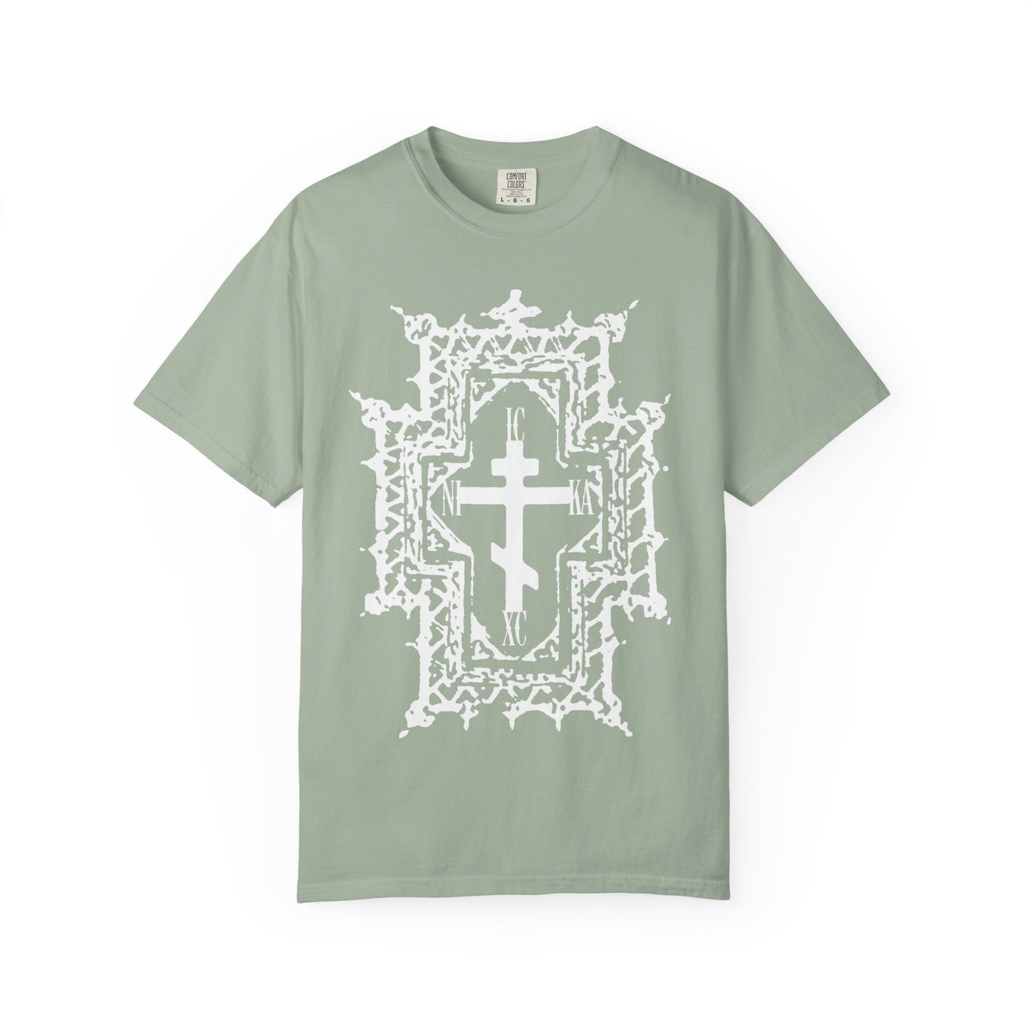 Bay-colored heavyweight cotton unisex tee featuring a large white ornate Orthodox Cross in a gothic cathedral style, inspired by the crown of thorns and symbolizing Jesus’ sufferings, with “ICXC NIKA | Jesus Christ Conquers” and “Healed By His Wounds” themes centered on the front.