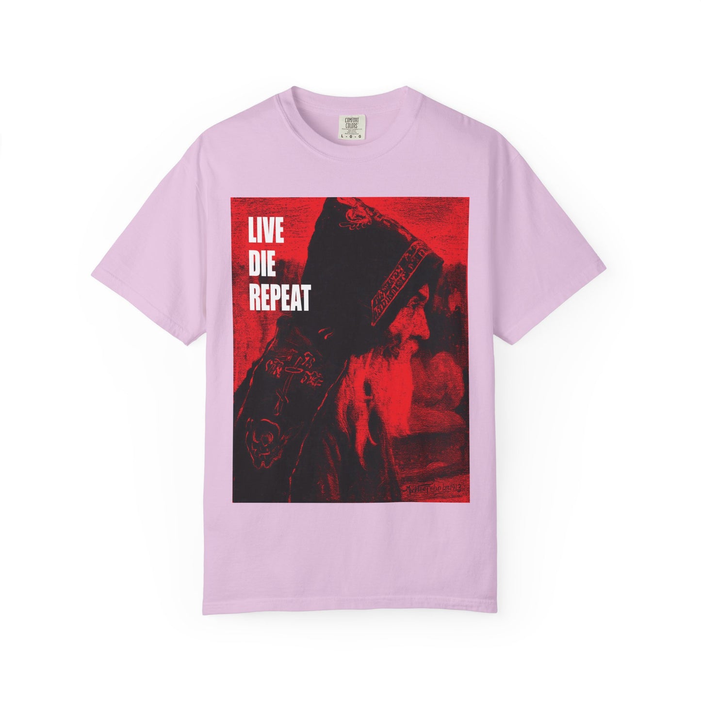 Orchid heavyweight cotton unisex tee featuring Mikhail Nesterov’s Orthodox monk art with bold “LIVE DIE REPEAT” text—an ascetic design inspiring you to "Die Every Day, You Will Live Forever.