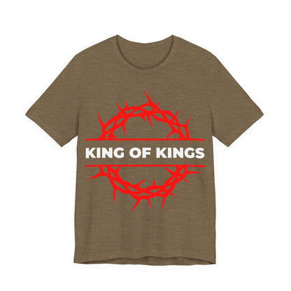 Heather olive unisex tee featuring a red crown of thorns and bold white “KING OF KINGS” on the front, inspired by Revelation 19:16—Christ as King of Kings. Perfect for Orthodox Christians. Cotton.