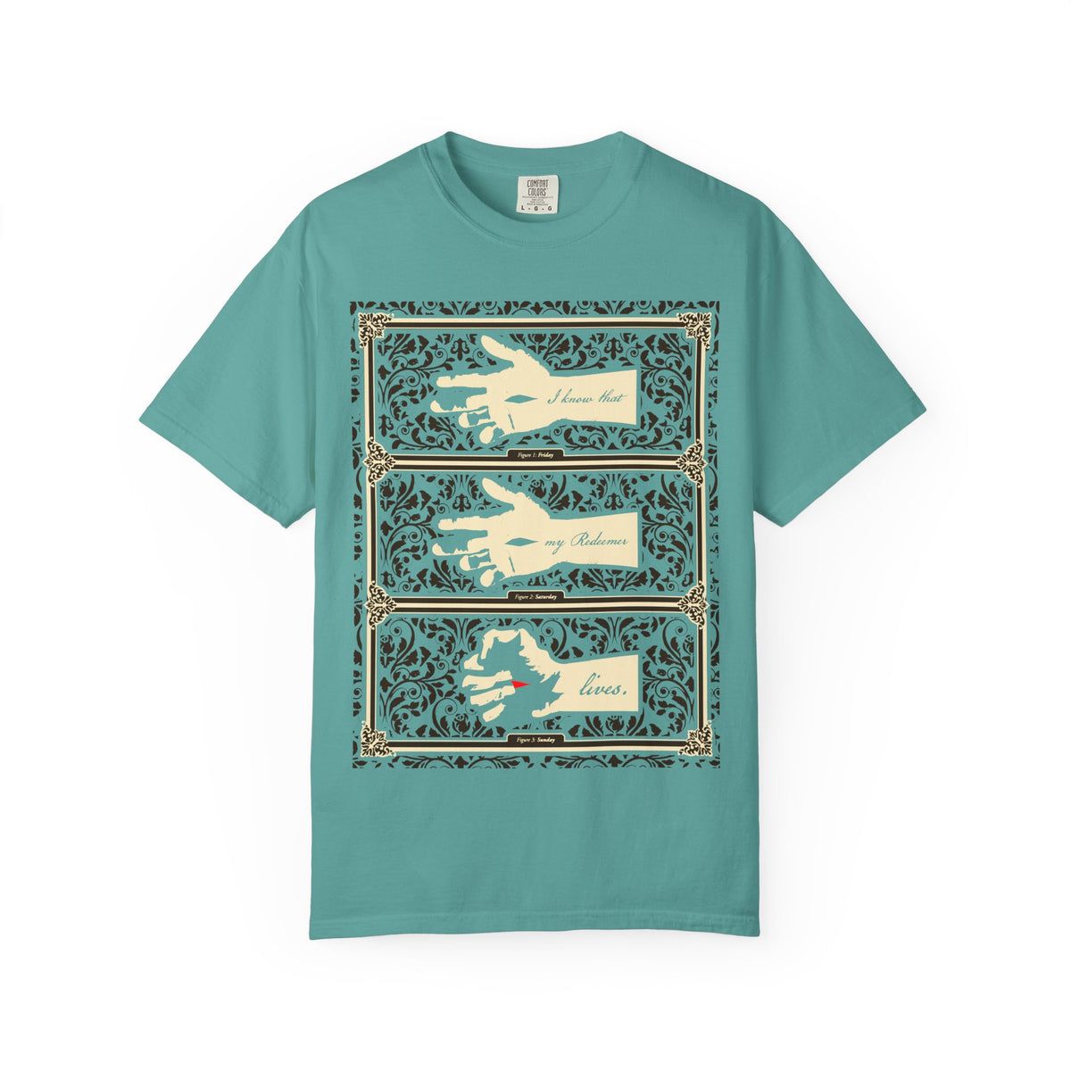 Seafoam heavyweight cotton unisex tee featuring an earthtone Americana style illustration of the crucified Christ’s hand, ornate borders, and the phrase “I Know That My Redeemer Lives” (Job 19:25), subtly evoking resilience and faith amid life’s challenges.
