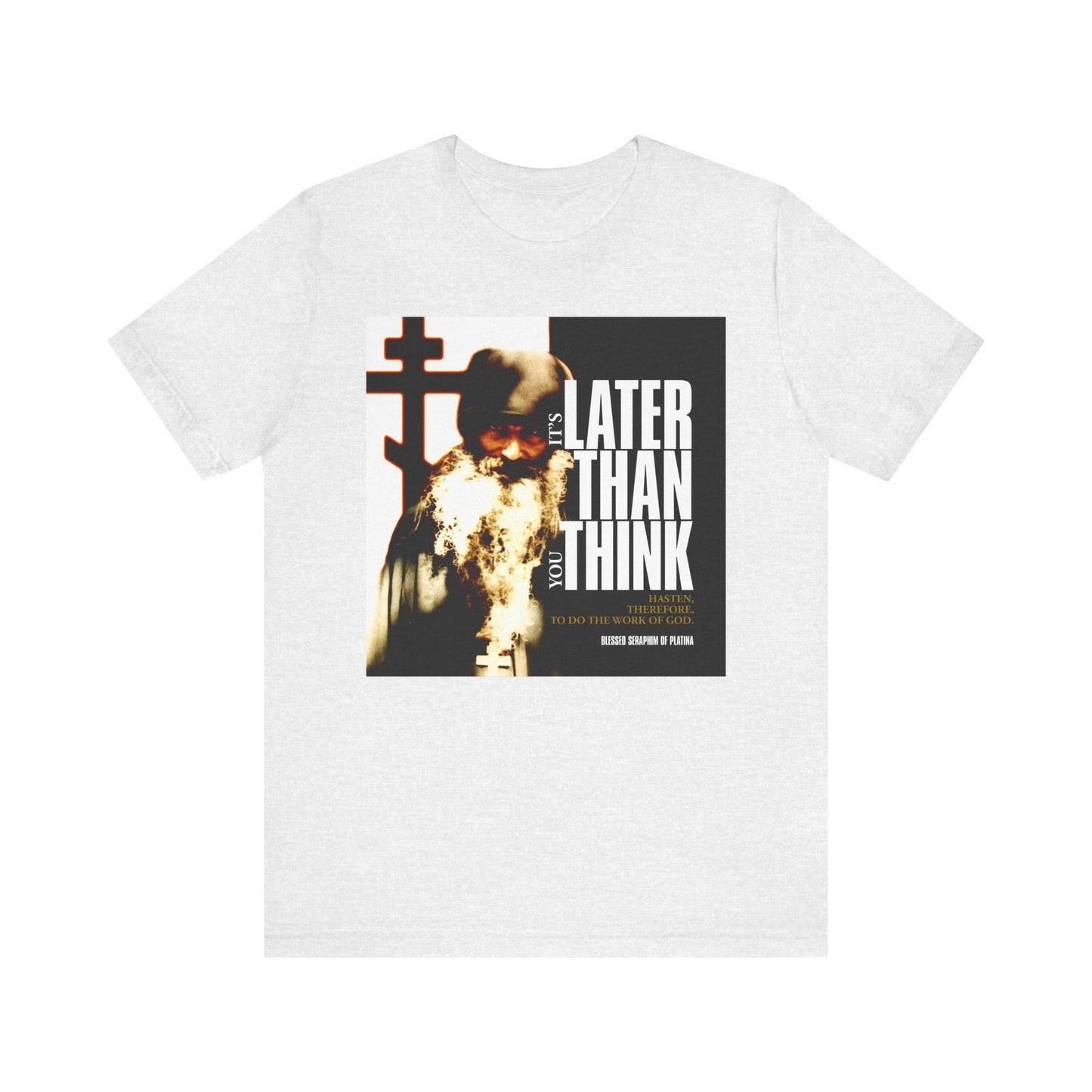 Ash lightweight cotton unisex t-shirt featuring St. Seraphim Rose's photo with modern cinematic poster typography: "It's Later Than You Think"—a bold reminder inspired by Orthodox faith.
