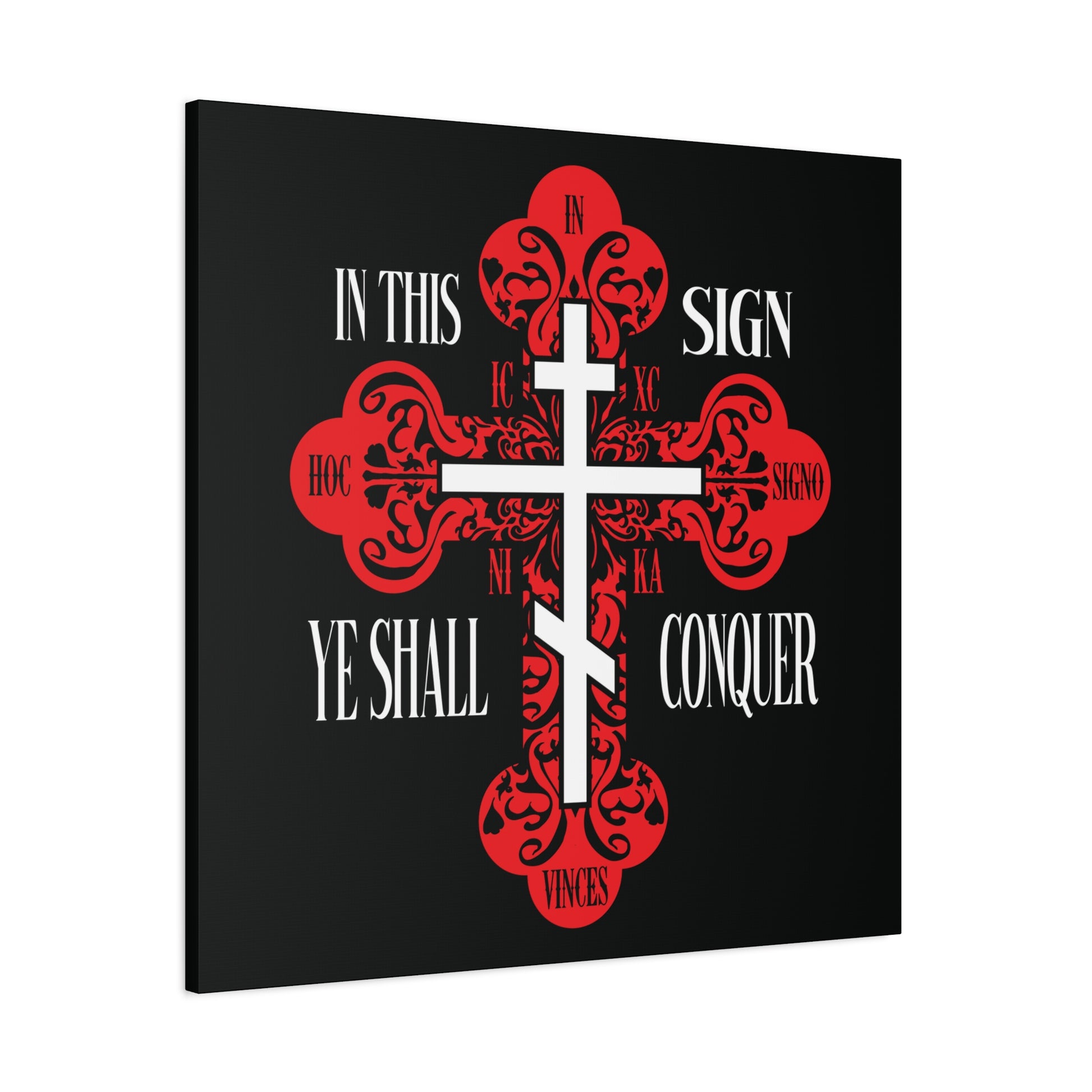 The "In This Sign Ye Shall Conquer" wall art features a red ornate Orthodox cross on black with "ICXC NIKA" and "Jesus Christ Conquers," symbolizing victory through faith in Jesus.