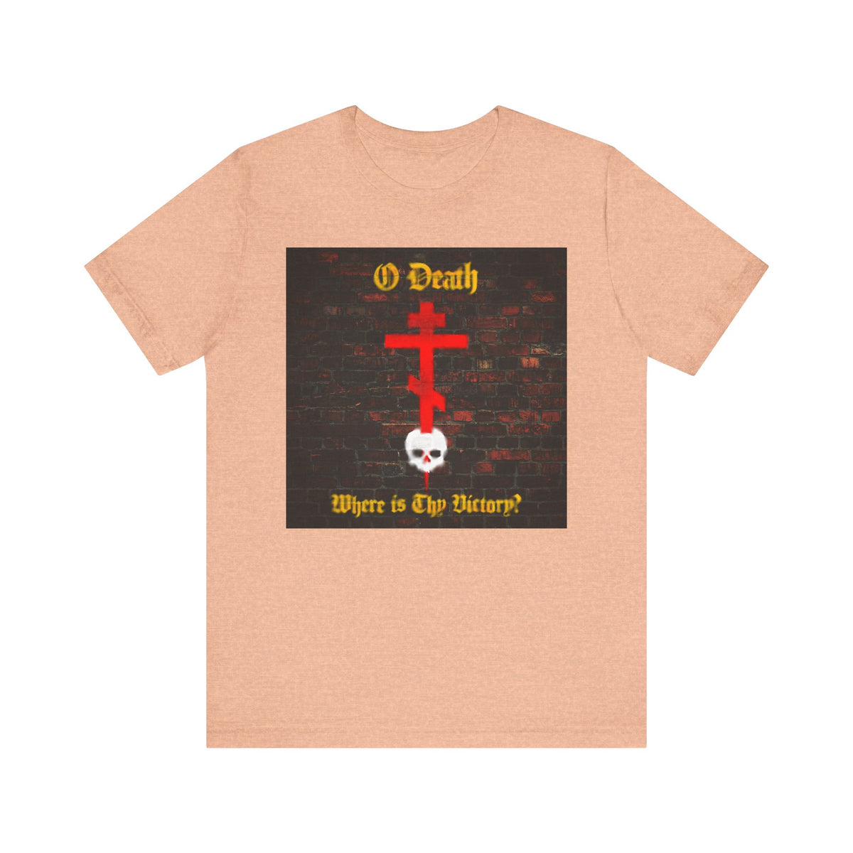 Heather peach t-shirt featuring a red Orthodox cross stabbing a white skull with the text, "O Death, Where is Thy Victory?"—inspired by St Cyril of Jerusalem—displayed in a brick wall graffiti aesthetic and reflecting on the sting of death overcome through Baptism.
