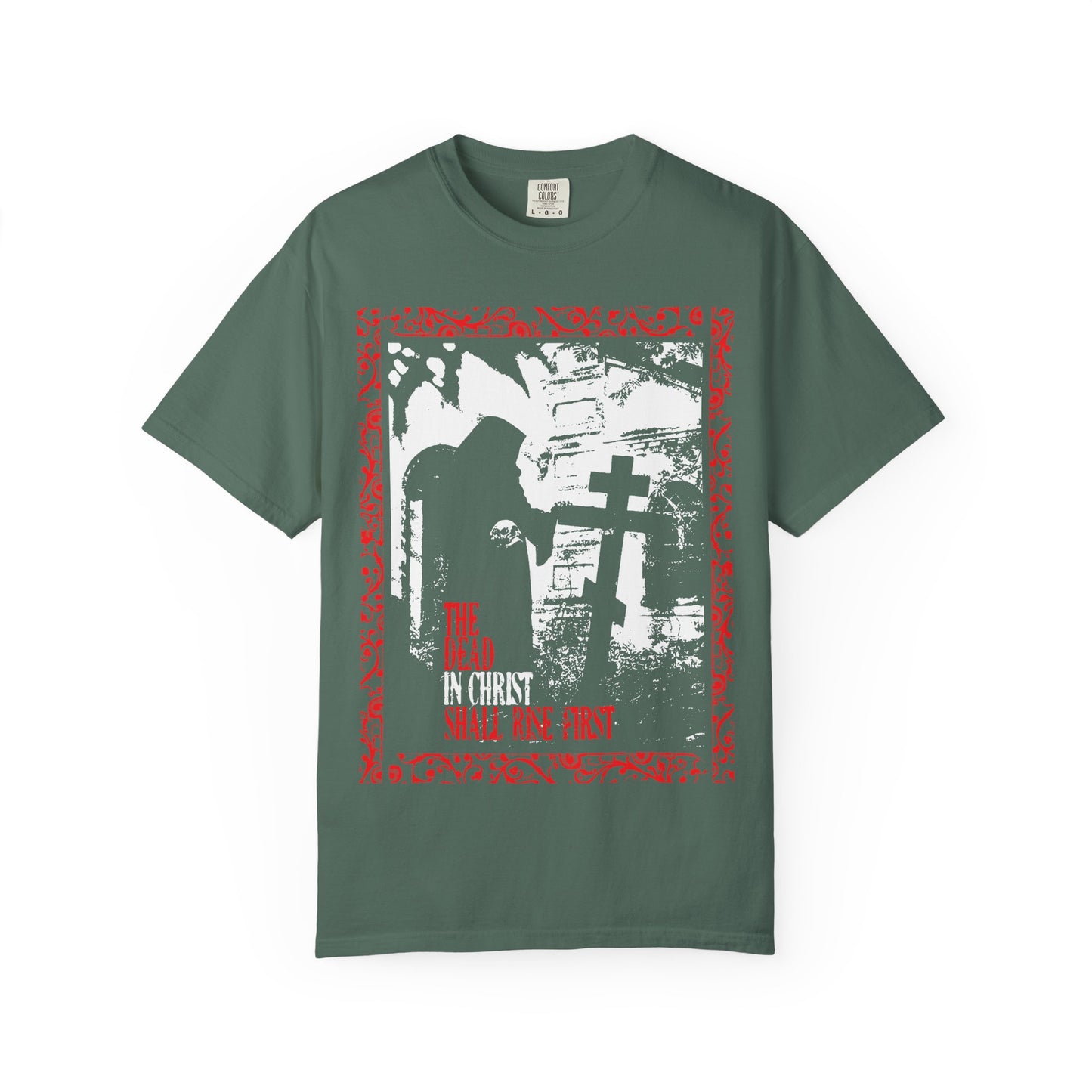 Blue spruce heavyweight cotton unisex tee featuring a gothic graveyard design with a cloaked figure and cross, inspired by 1 Thessalonians 4:16 and symbolizing the liberation of the soul and blessings after death, with red decorative border and text. Product name: "The Dead in Christ Shall Rise First | Gothic Graveyard Design | Orthodox Christian.