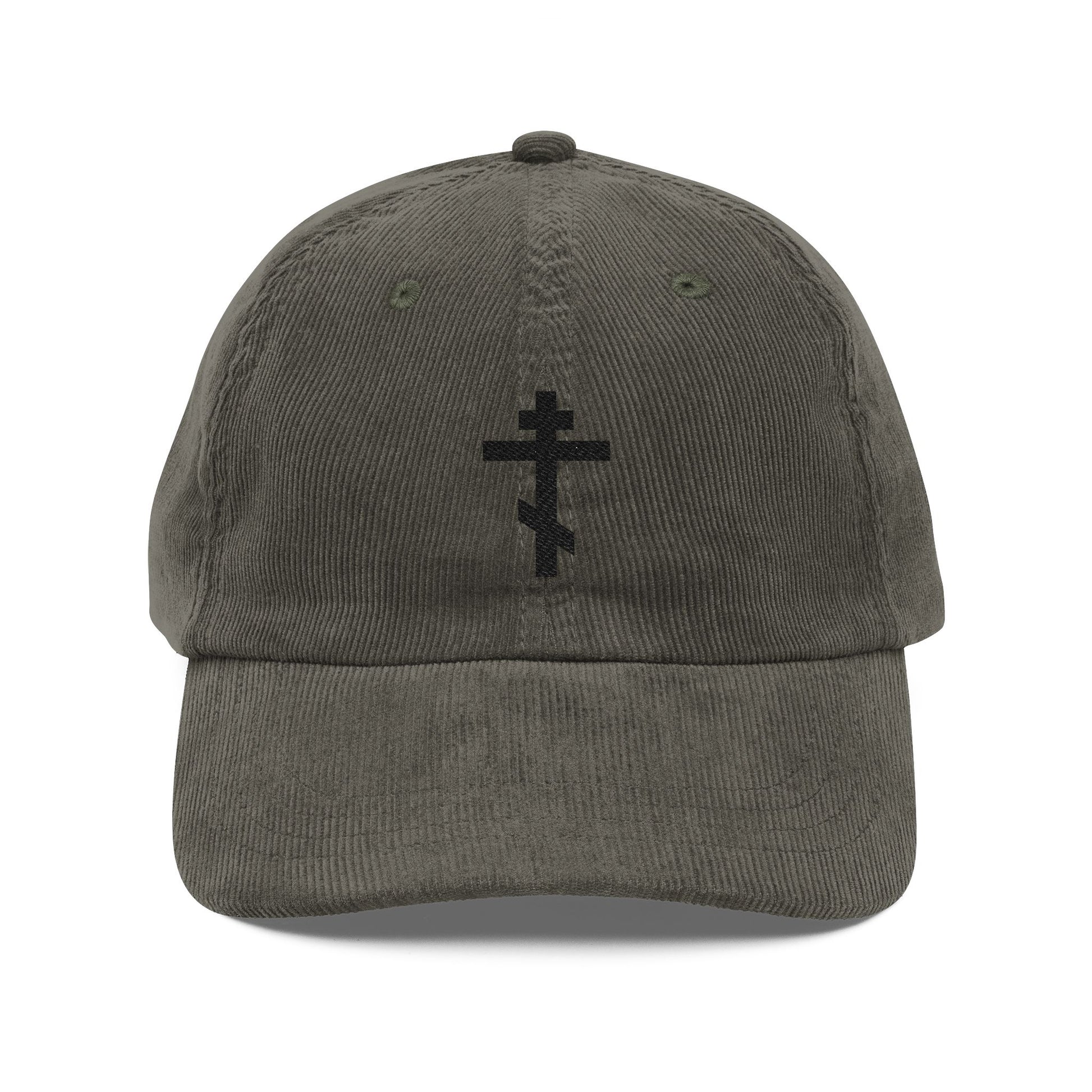 Olive corduroy cap featuring a black embroidered Orthodox TriBar Cross on the front, symbolizing the Weapon of Unseen Warfare Which Makes Demons Tremble.