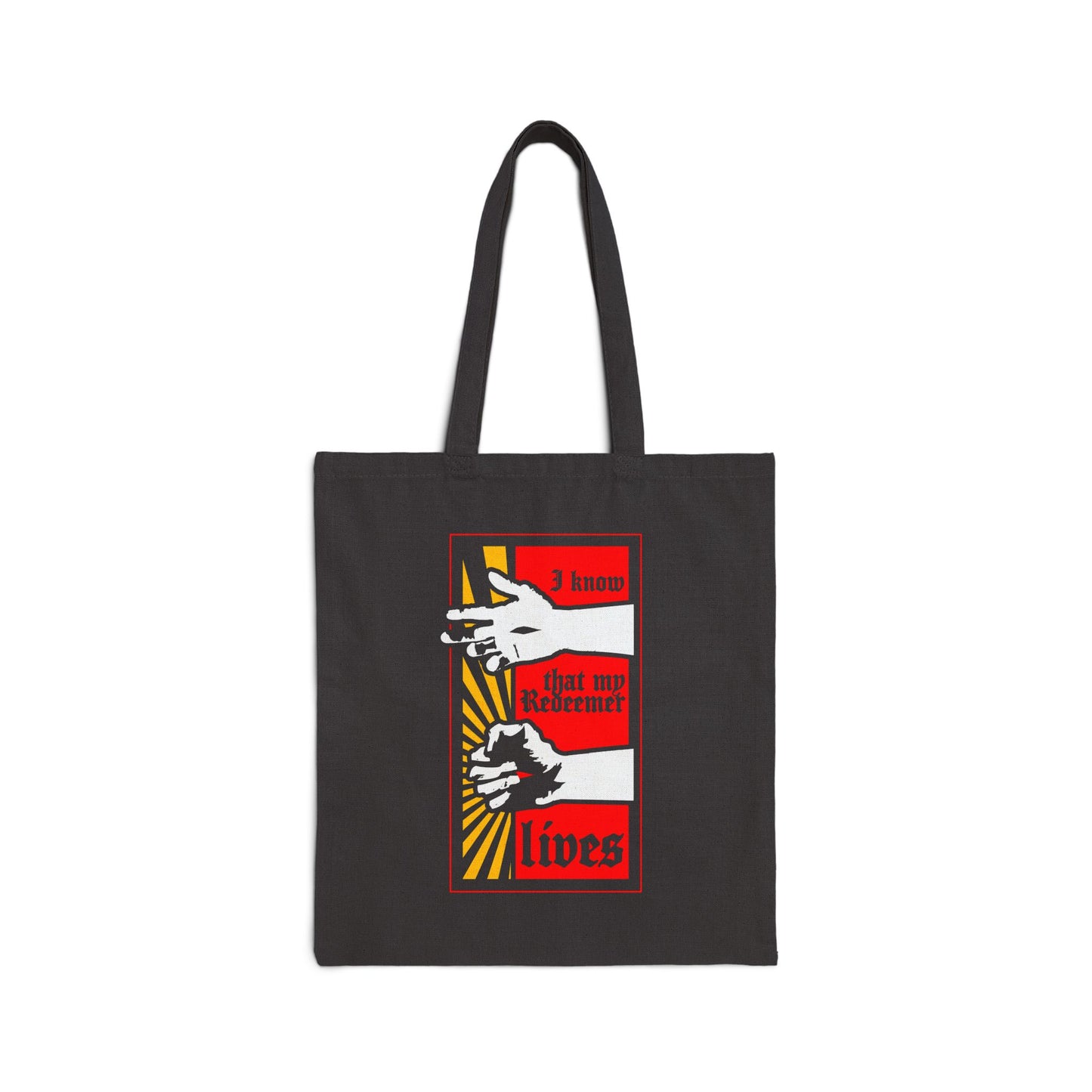 Black Orthodox Christian tote bag featuring a comic book–style "I Know That My Redeemer Lives" (Job 19:25) design—resurrected Jesus’ fist radiates divine power, combining faith and style in bold red, black, yellow, and white.