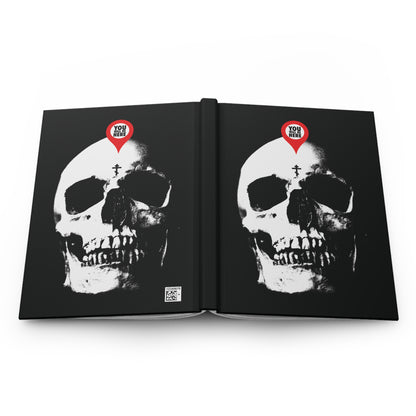 The "You Will Be Here Maps Marker on Skull Design" Orthodox Blank Journal features skulls with markers above their foreheads, inscribed with Memento Mori reminders: "What You Are I Once Was" and "Remember You Will Die.