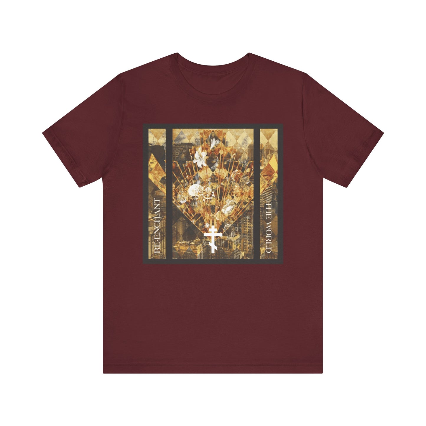 Maroon "Re-Enchant the World" lightweight cotton unisex tee featuring a modern graphic design of a cityscape with a white cross and flowers in earthtones, inspired by the Exaltation of the Cross, with "REST AGAINST THE WORLD" text encircling the design.