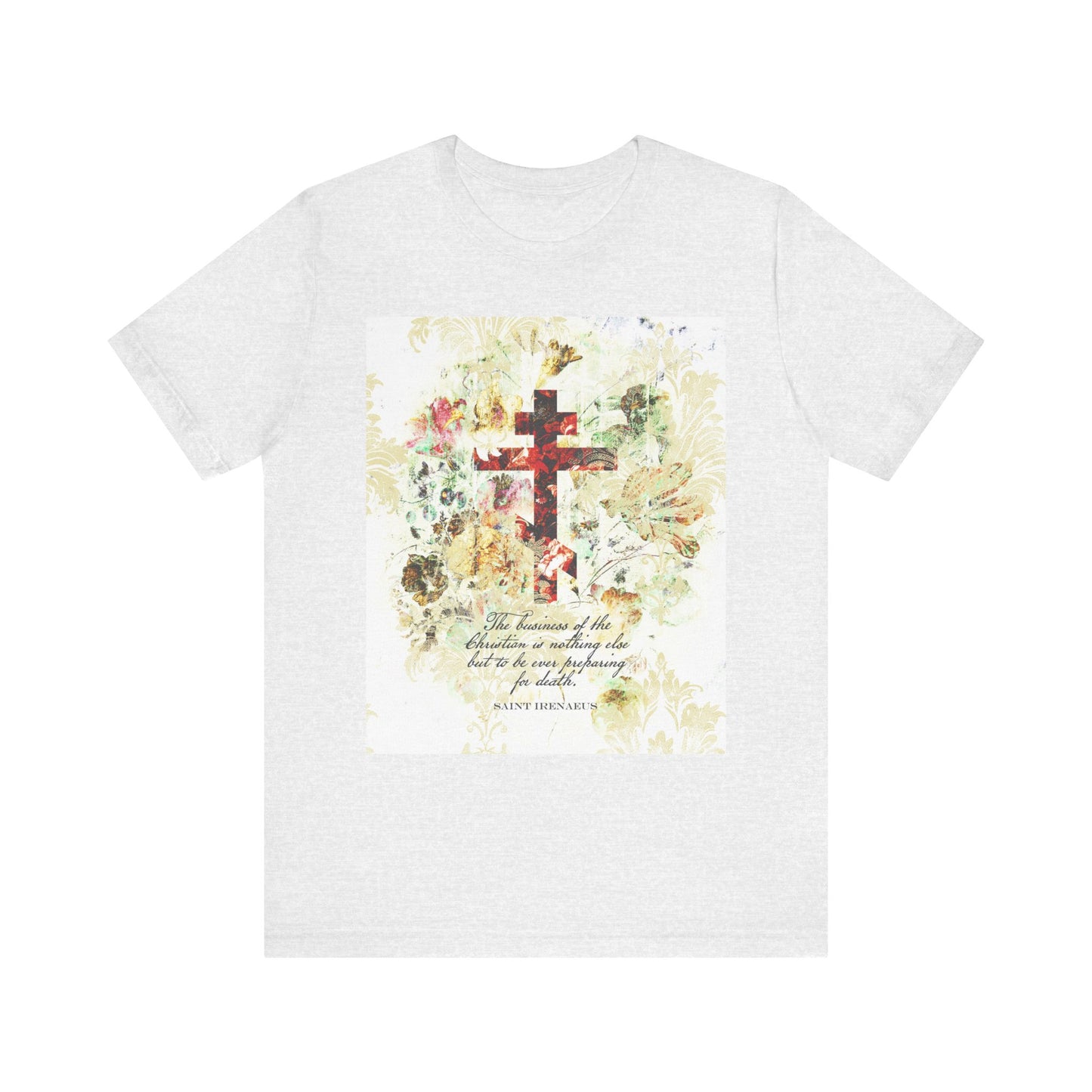 Ash t-shirt featuring a white and beige floral scrapbook-texture cross in an arts & crafts style, paired with an inspirational quote from St. Irenaeus—an uplifting lightweight cotton unisex tee, ideal for thoughtful Christian reflection on preparing for death.