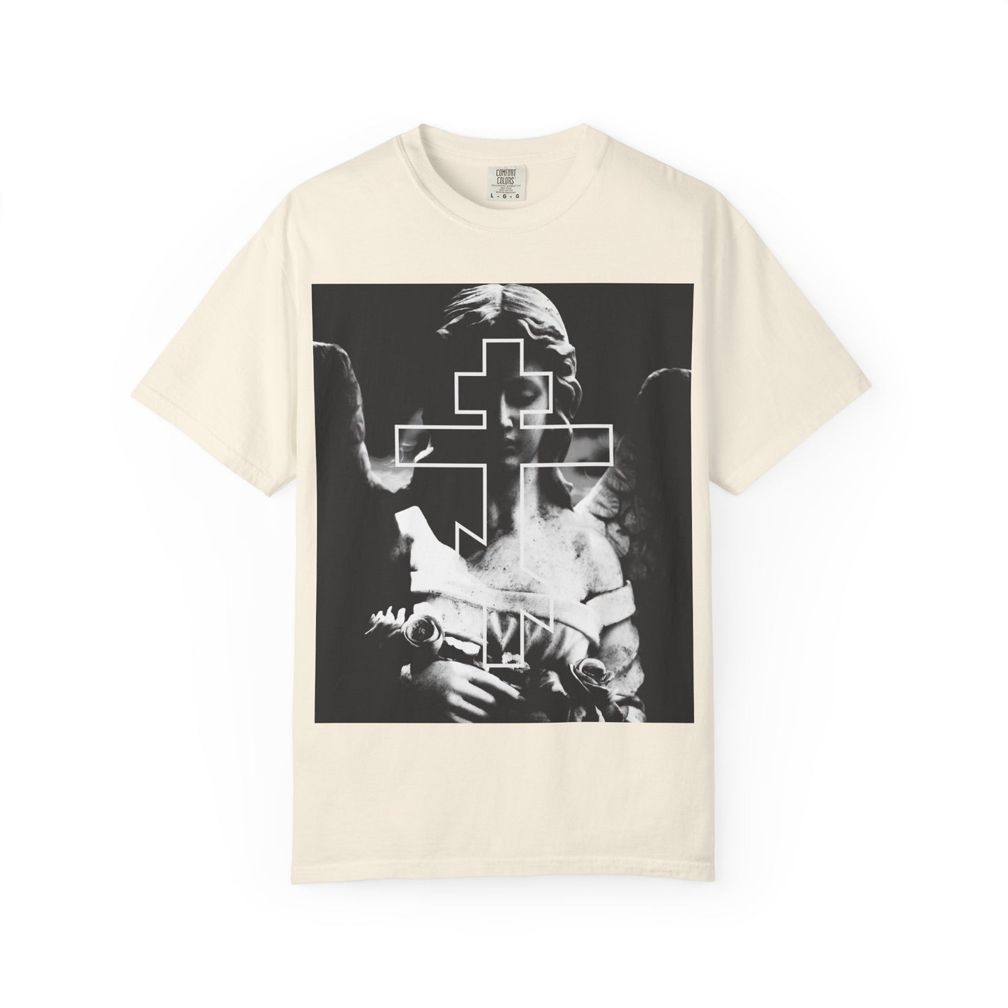 Ivory heavyweight cotton tee featuring a grayscale Cemetery Angel with Orthodox Cross—a memento mori statement piece. Unisex fit, perfect for goth aesthetic and those embracing “Remember You Will Die.”.