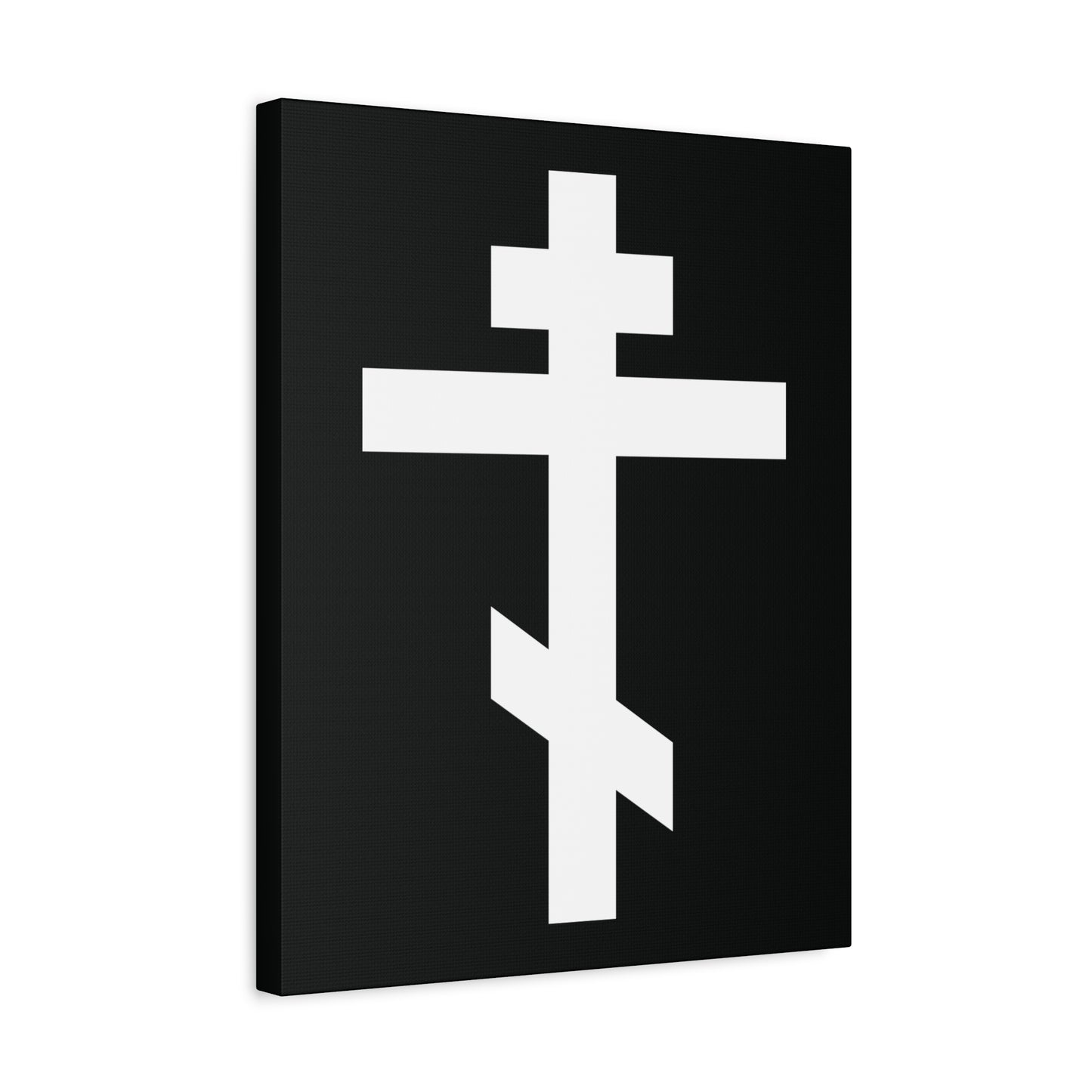 The "White Orthodox Cross" Orthodox Canvas Art features a white cross, symbolizing Christ, centered on a black rectangular canvas set at a slight left angle. Includes Galatians 6:14: "May I never boast, except in the cross of our Lord Jesus Christ.