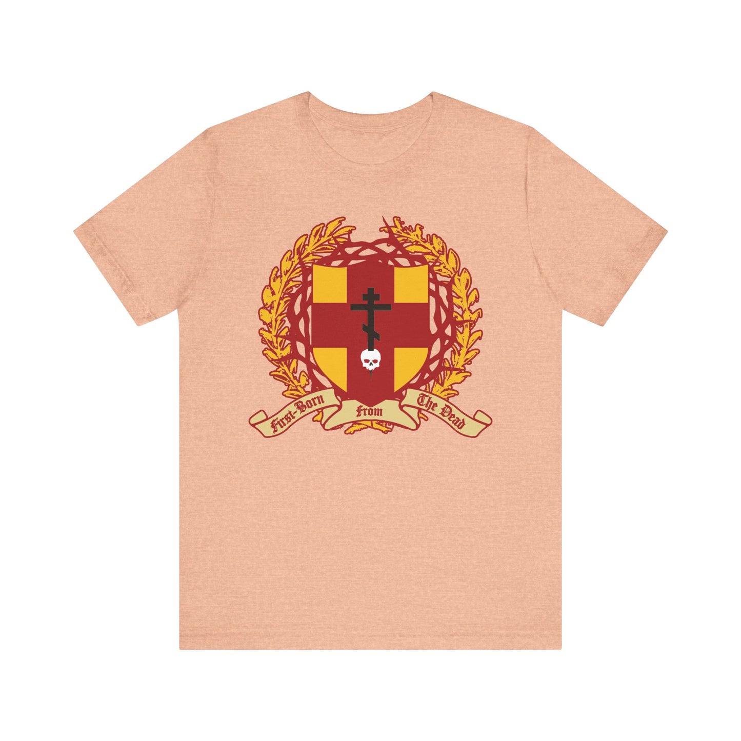 Heather peach unisex t-shirt features a heraldic shield with Orthodox cross stabbing a skull, crown of thorns, and Col 1:18 "First-Born from the Dead"—symbolizing Christ’s victory over death and redemption. Lightweight cotton.