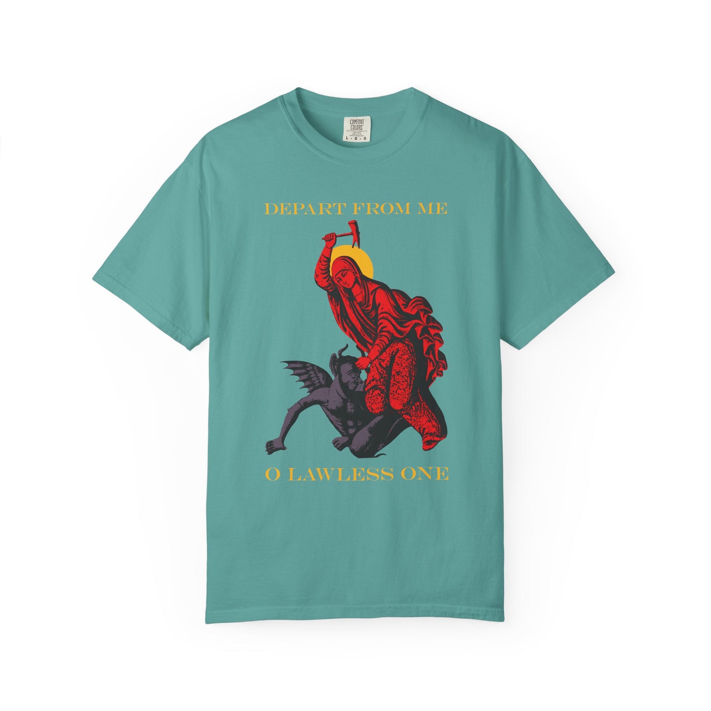 A seafoam heavyweight tee featuring St Marina beating the devil with a hammer and the phrase “Depart from Me O Lawless One”—inspired by the Life of the Great Martyr Marina.