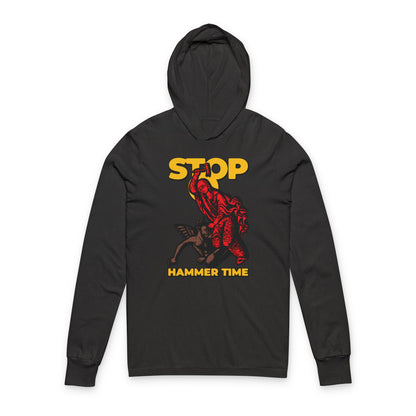 Black hoodie featuring "Stop, Hammer Time" and a graphic of St Marina of Antioch beating the devil with a hammer in bold red, blue, and yellow. Modern Orthodox meme style Christian hooded shirt.