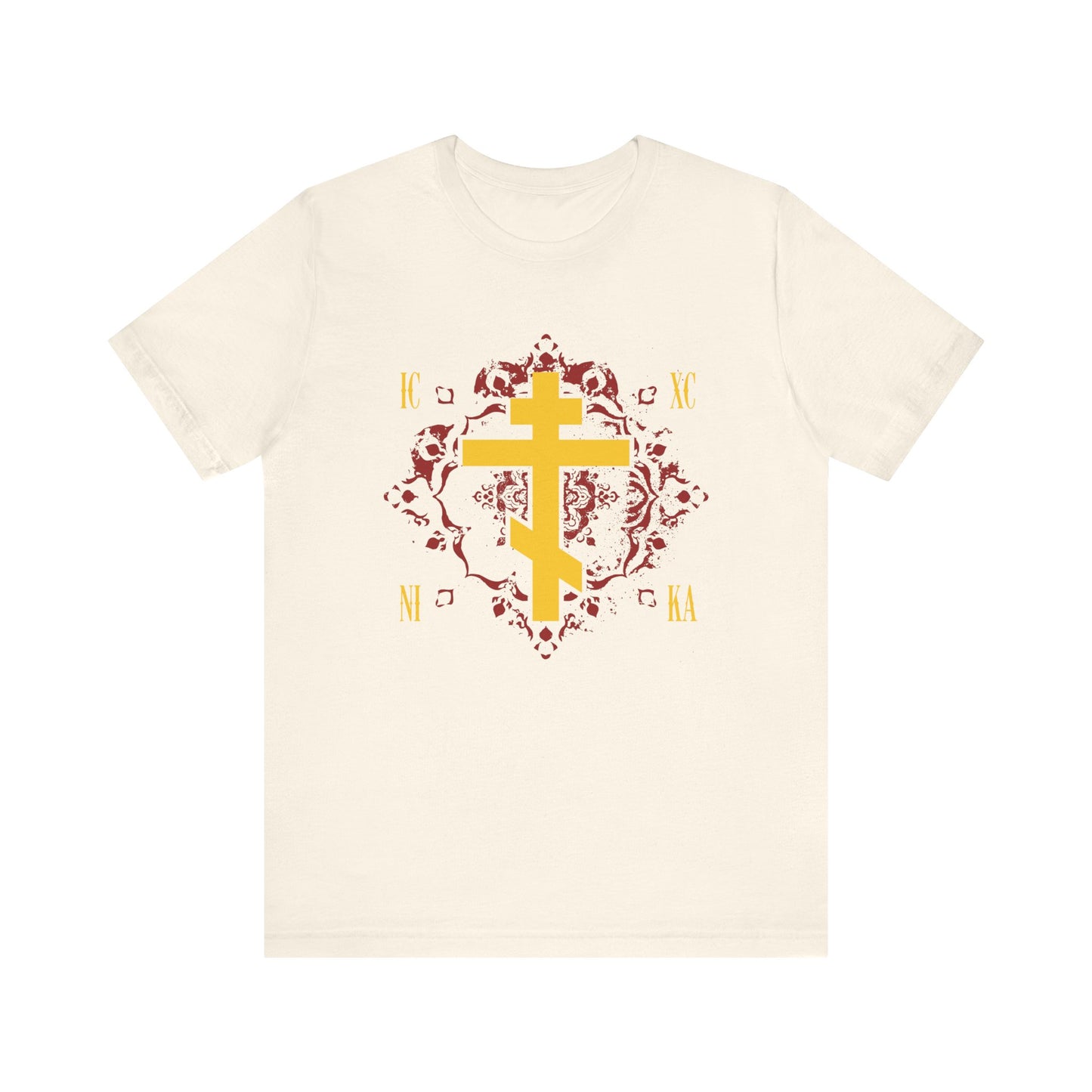 Natural t-shirt featuring a yellow Orthodox Cross on an ornate red background, Greek letters "IC XC NI KA," inspired by the teachings of St. Kosmas Aitolos and the grace of sonship—this Christian lightweight cotton unisex tee proclaims “Jesus Christ Conquers.”.