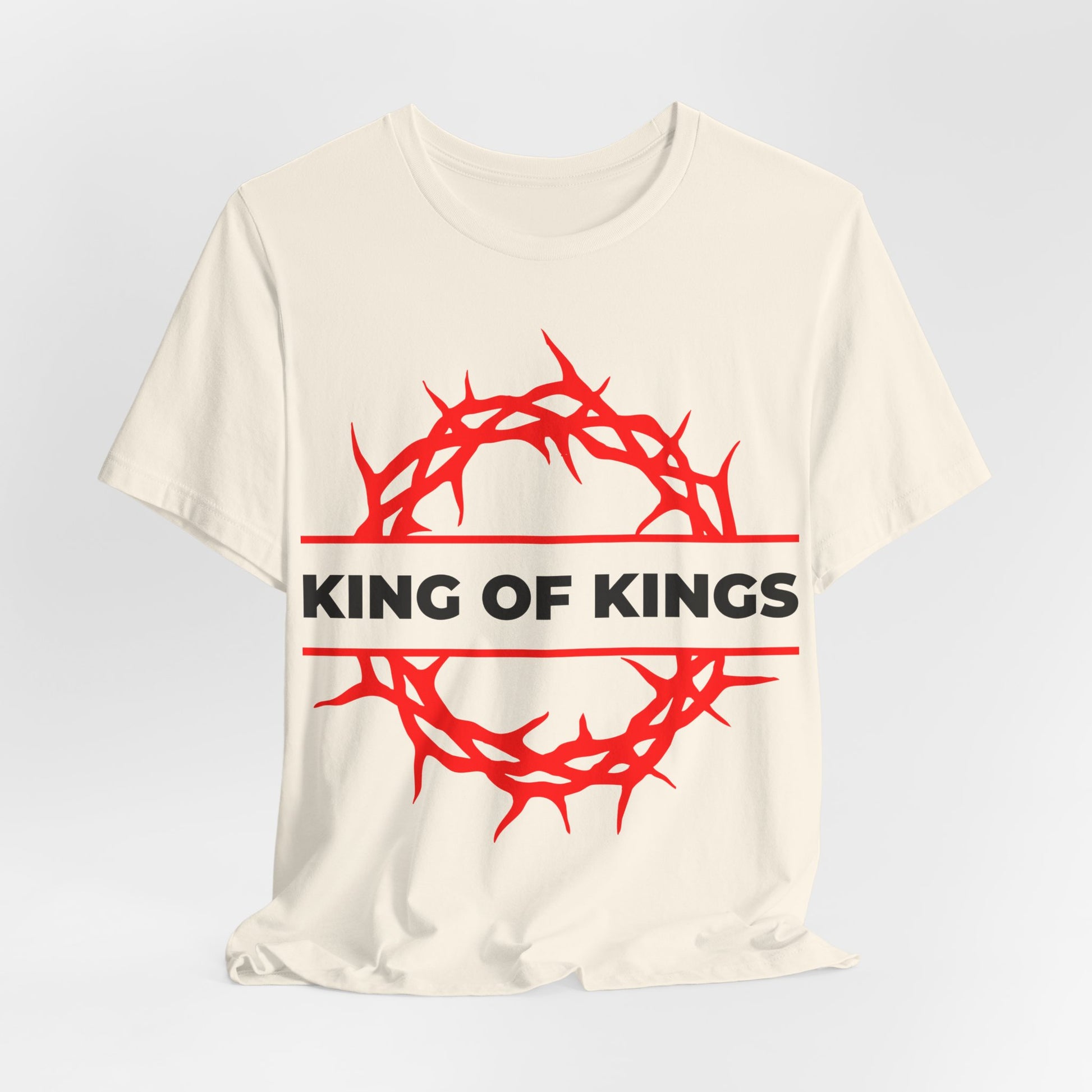 Beige unisex cotton tee featuring a red crown of thorns and bold KING OF KINGS text, inspired by Revelation 19:16. "King of Kings Crown of Thorns | The King of Glory | Orthodox Christian Tee.